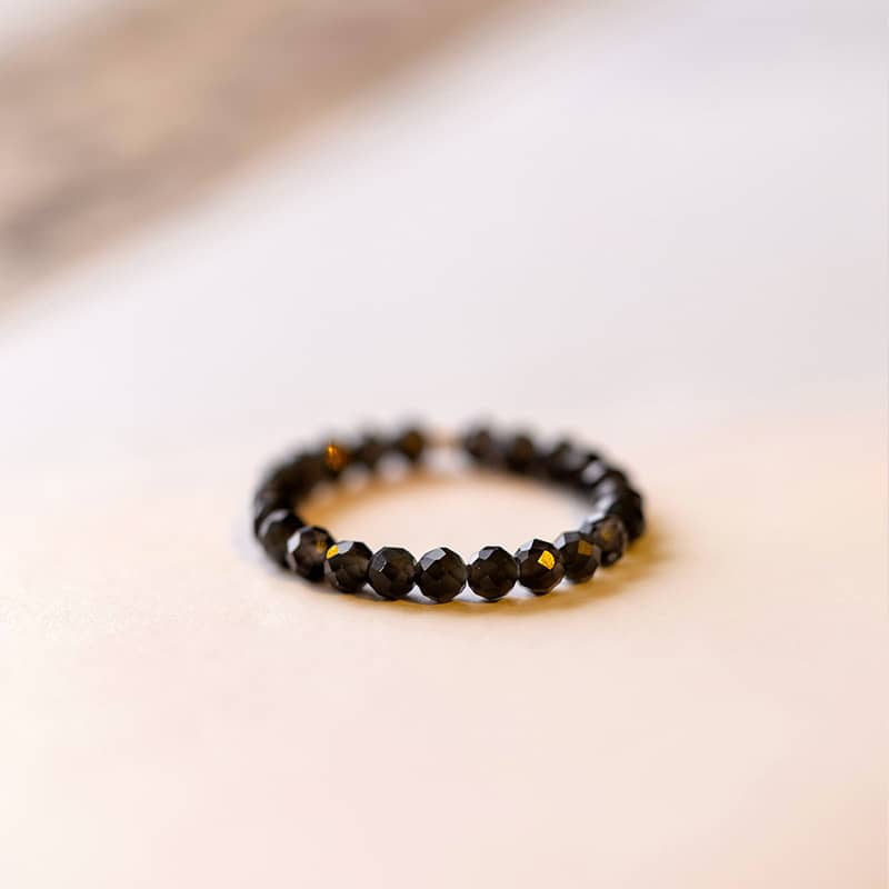 Black beaded anxious ring by 5 Senses, featuring an emotional support gemstone ring design