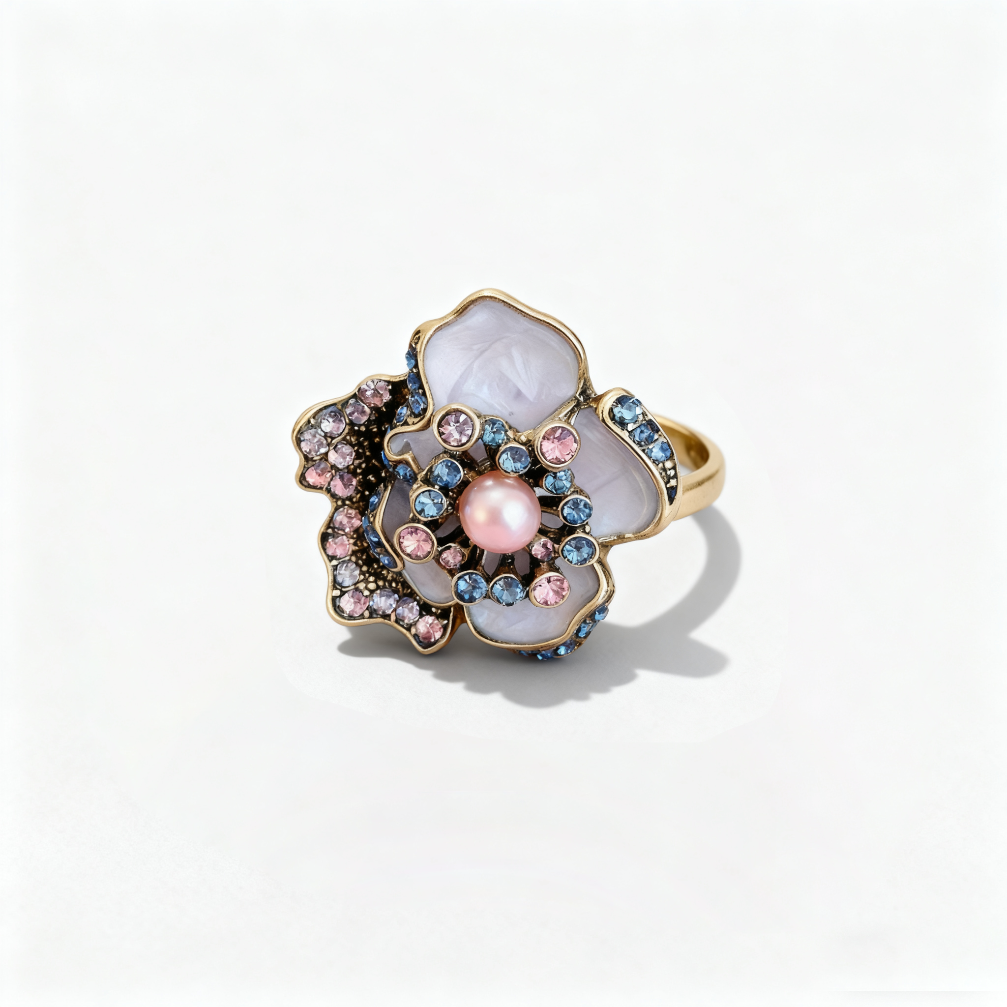 Stunning enamel flower ring with pearl center featuring colorful gemstone accents