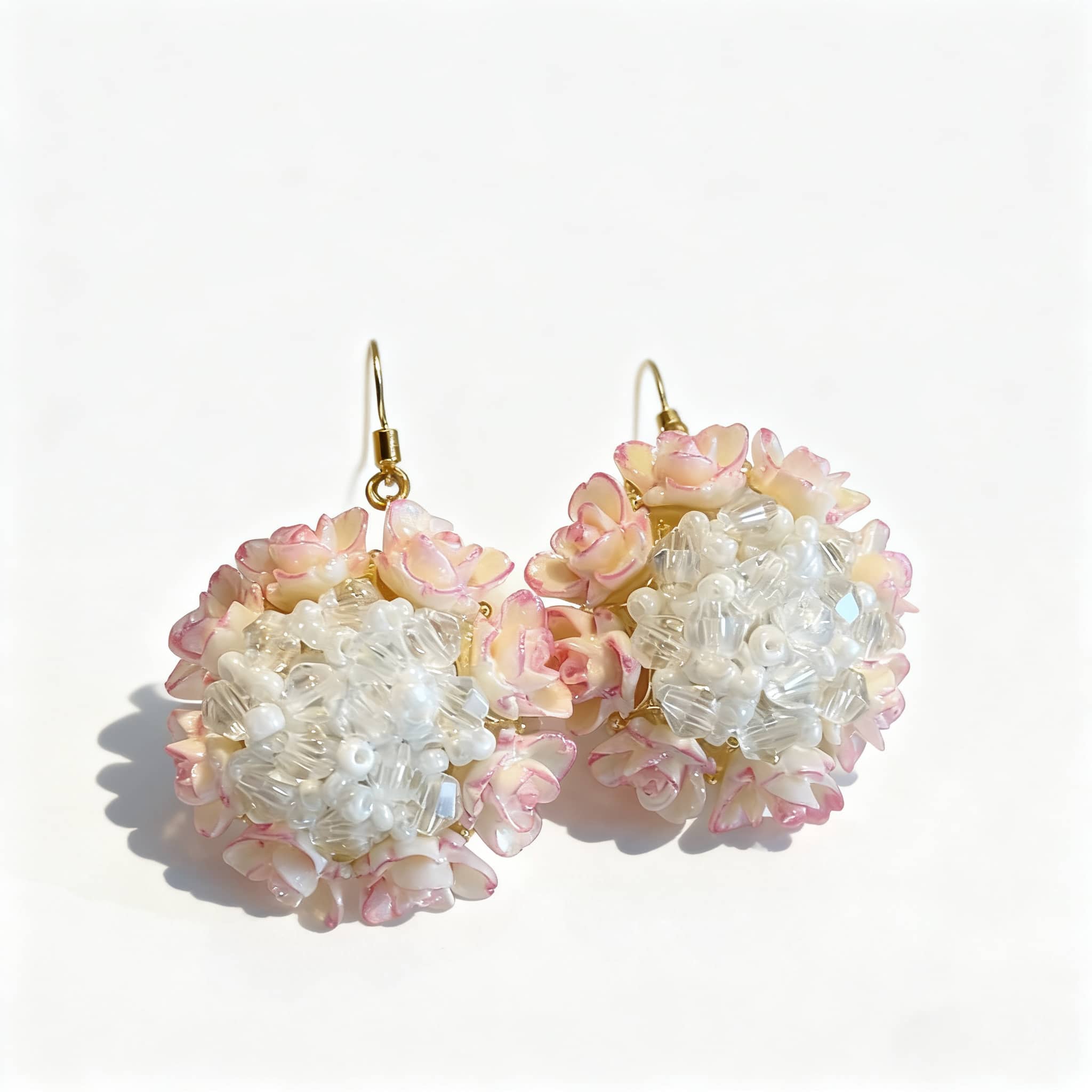Floral bead stud earrings with intricate flower design and soft color palette for a feminine touch
