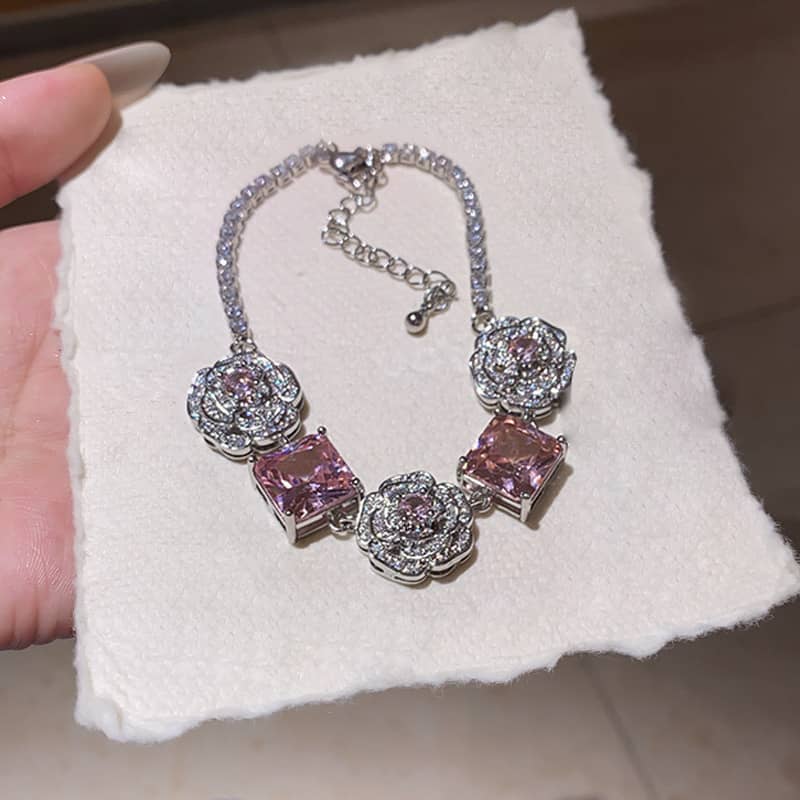 Elegant floral chain bracelet for women featuring pink gemstones and silver detailing