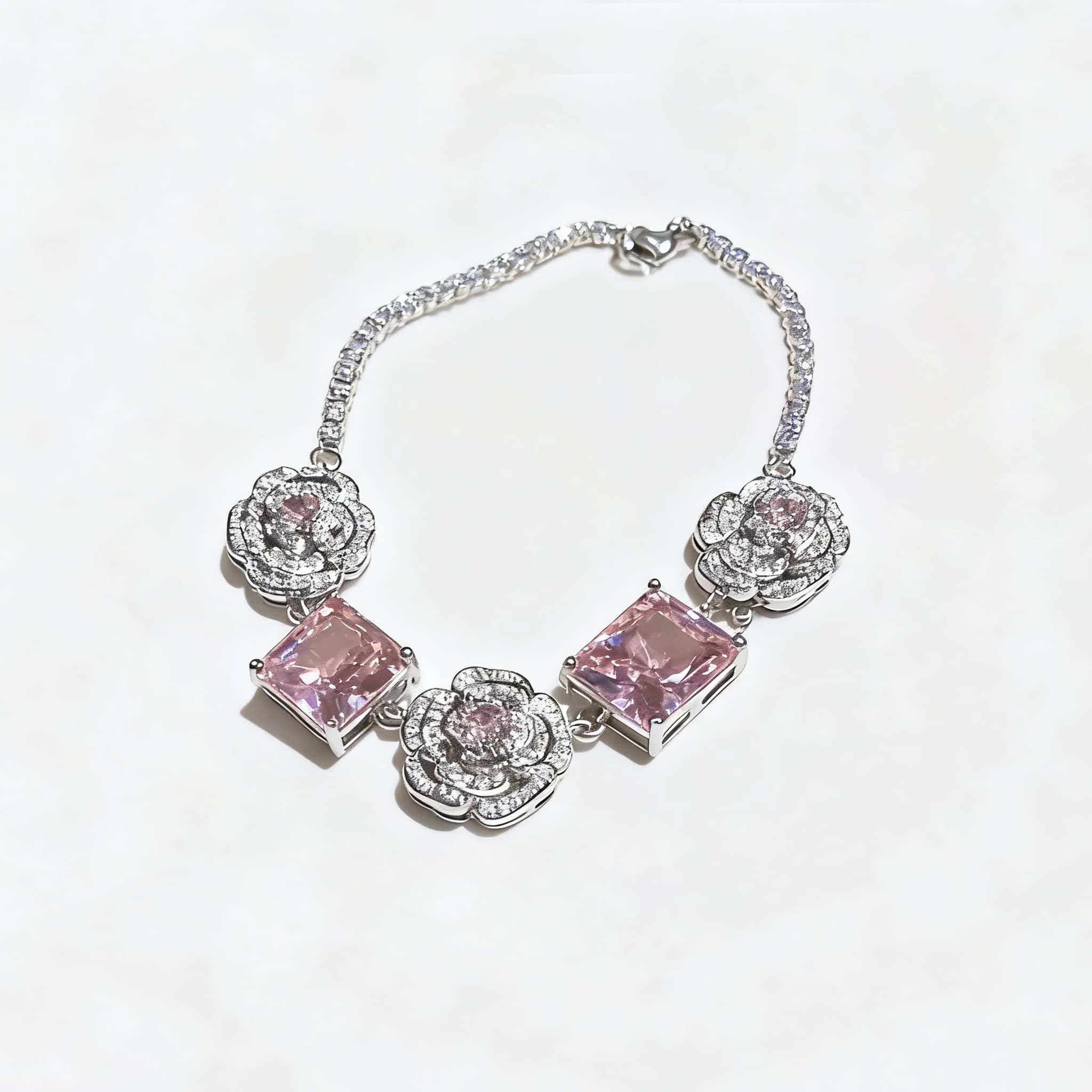 Floral chain bracelet for women featuring pink gemstones and floral designs