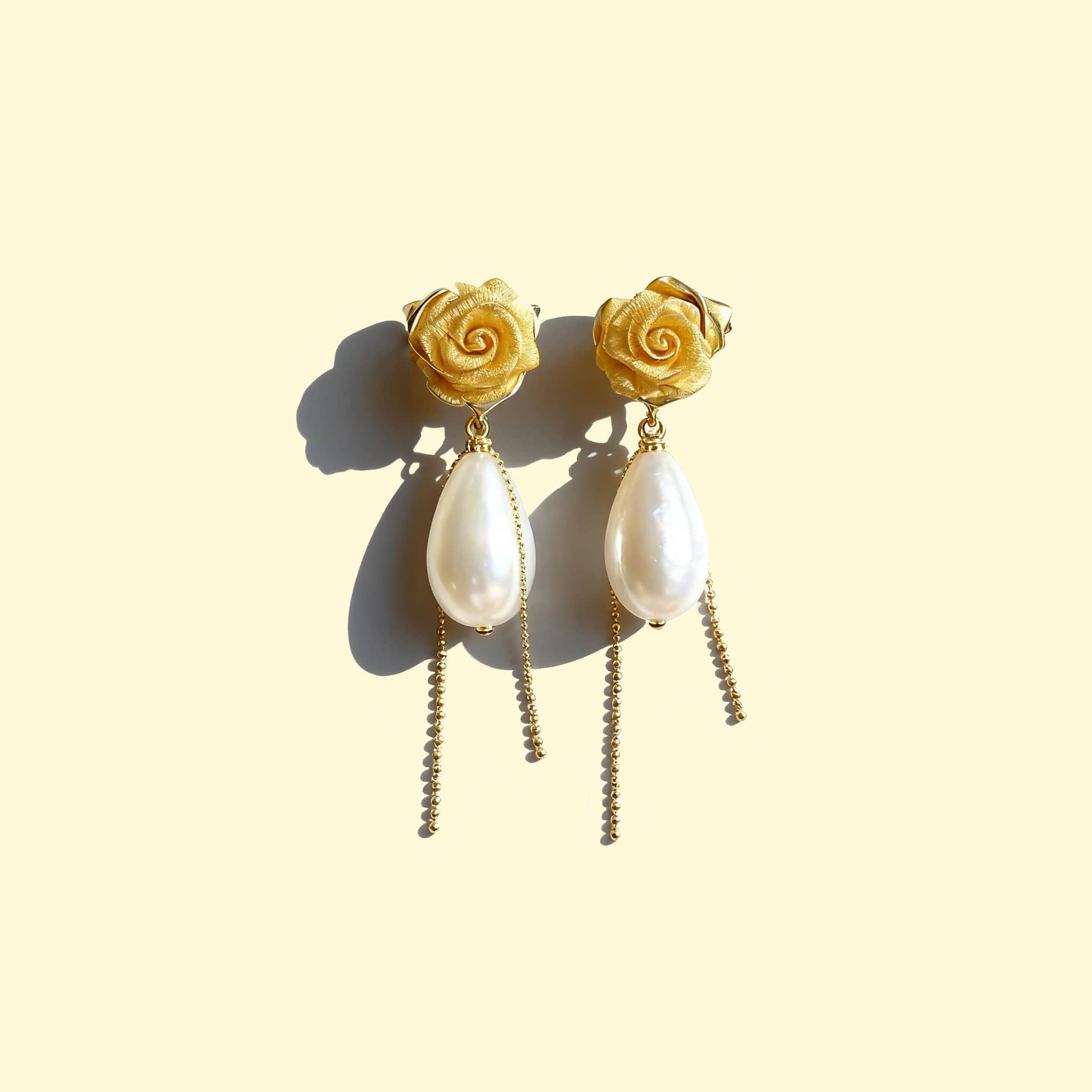5 Senses fabric floral statement earrings with yellow rose design and pearl drop accents