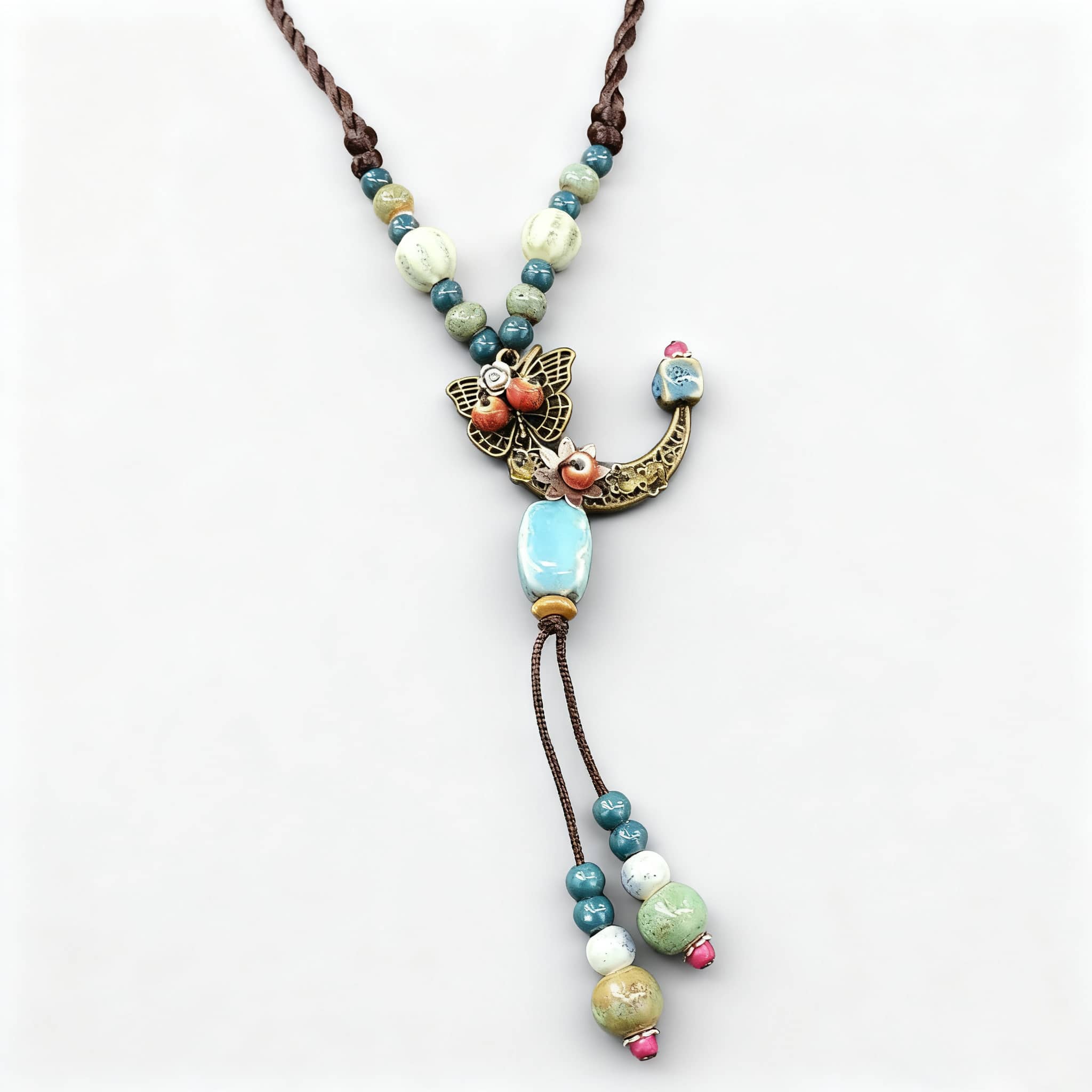 Unique floral moon pendant necklace featuring colorful beads and butterfly charm for a stylish look