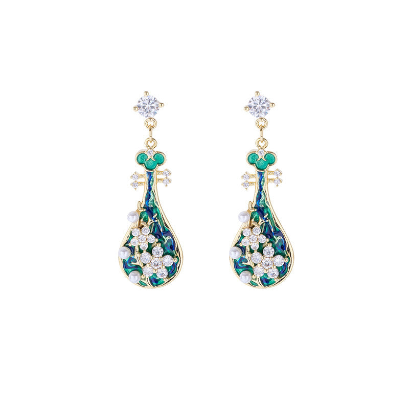 Calm floral statement earrings for women with gold detailing and crystal accents