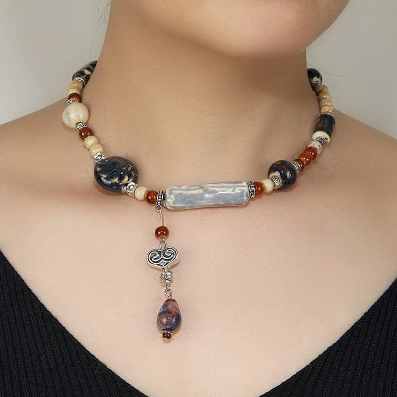 Lavender grey ceramic pendant necklace with unique beads for a stylish look