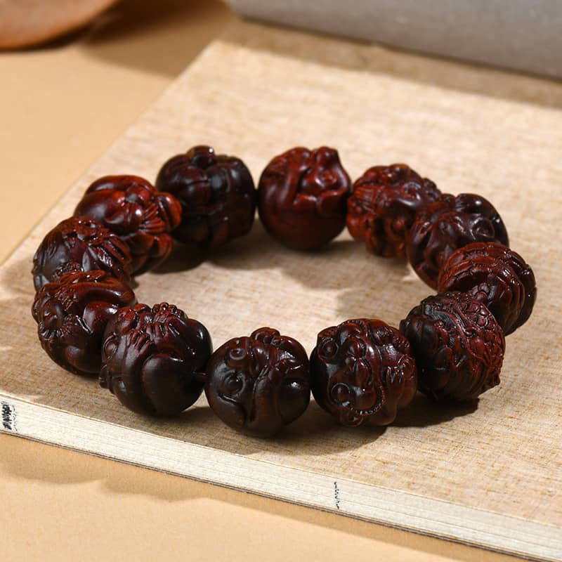 Calm — Zodiac Flow · Bloodwood Carved Zodiac Bracelet
