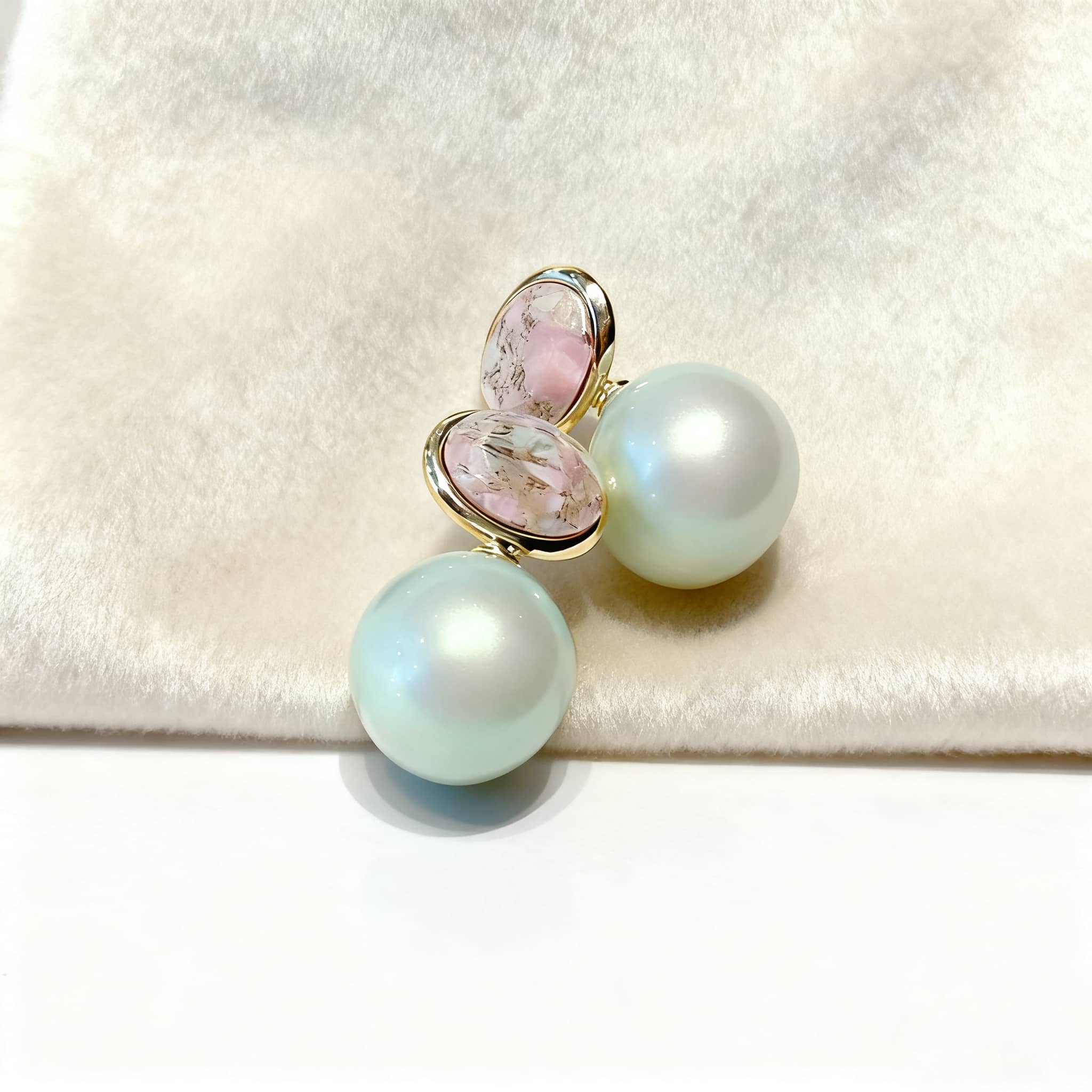 Mint pearl ceramic earrings featuring large, luminous pearls and delicate pastel accents