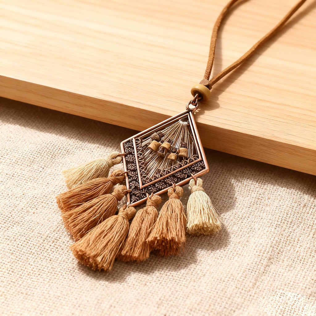 Fringe boho calming necklace with tassels and geometric pendant from 5 Senses for a stylish look