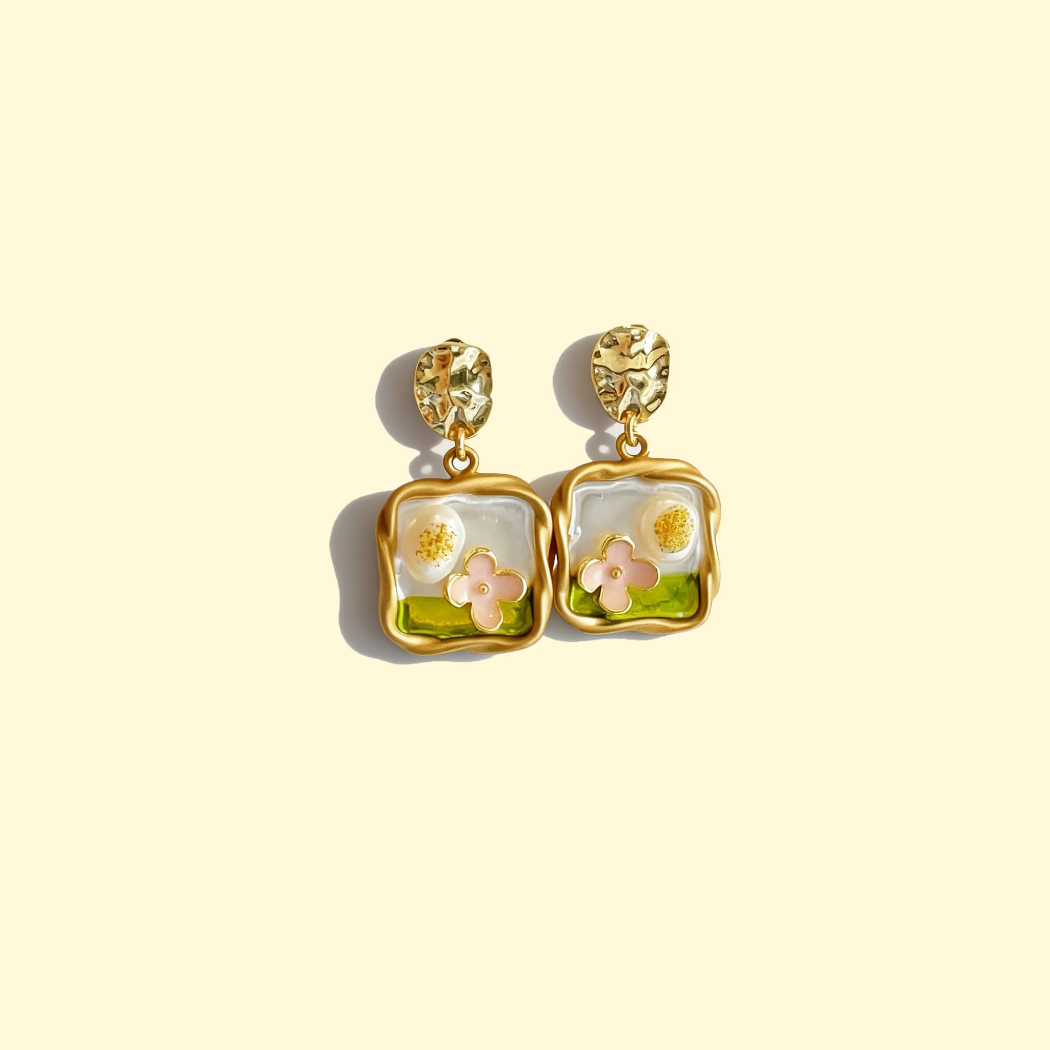 5 Senses garden enamel pearl earrings with colorful floral design and gold accents
