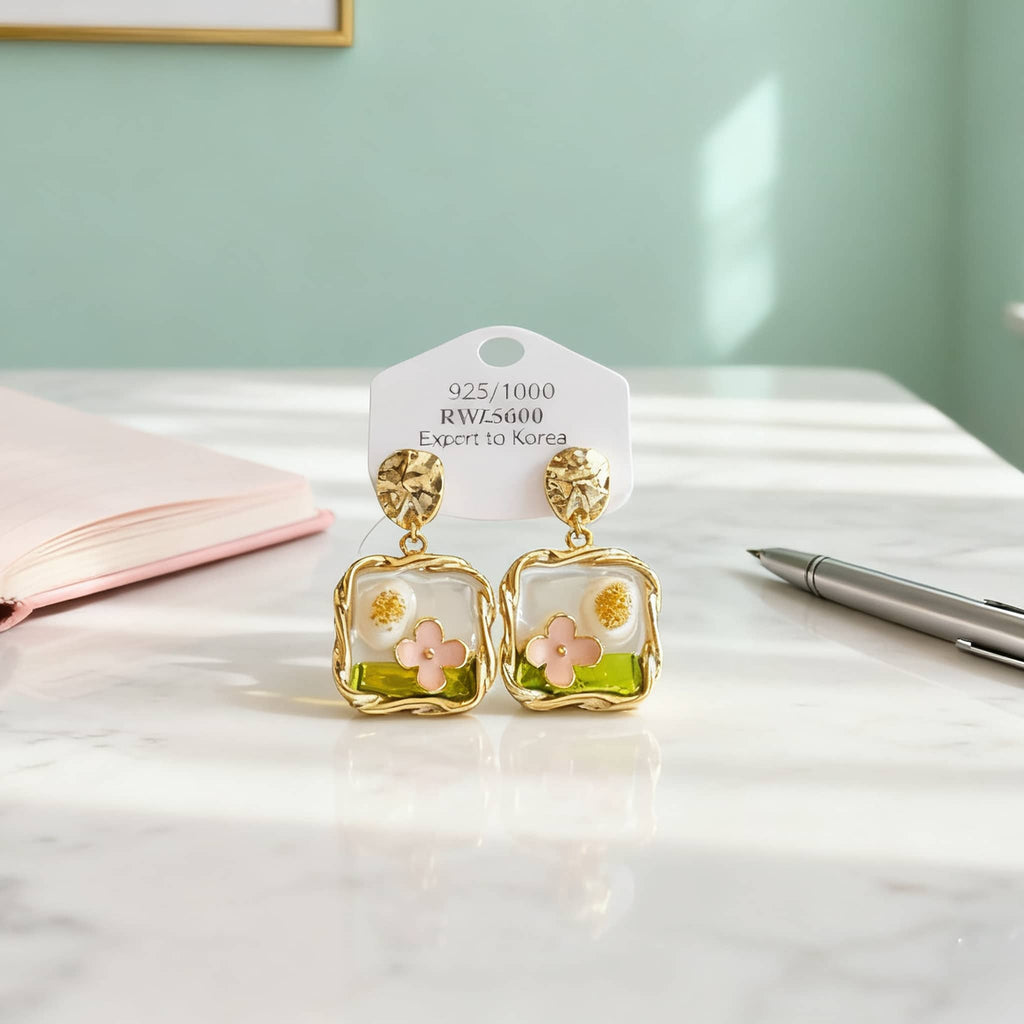 Garden enamel pearl earrings featuring floral designs with gold accents for a stylish look
