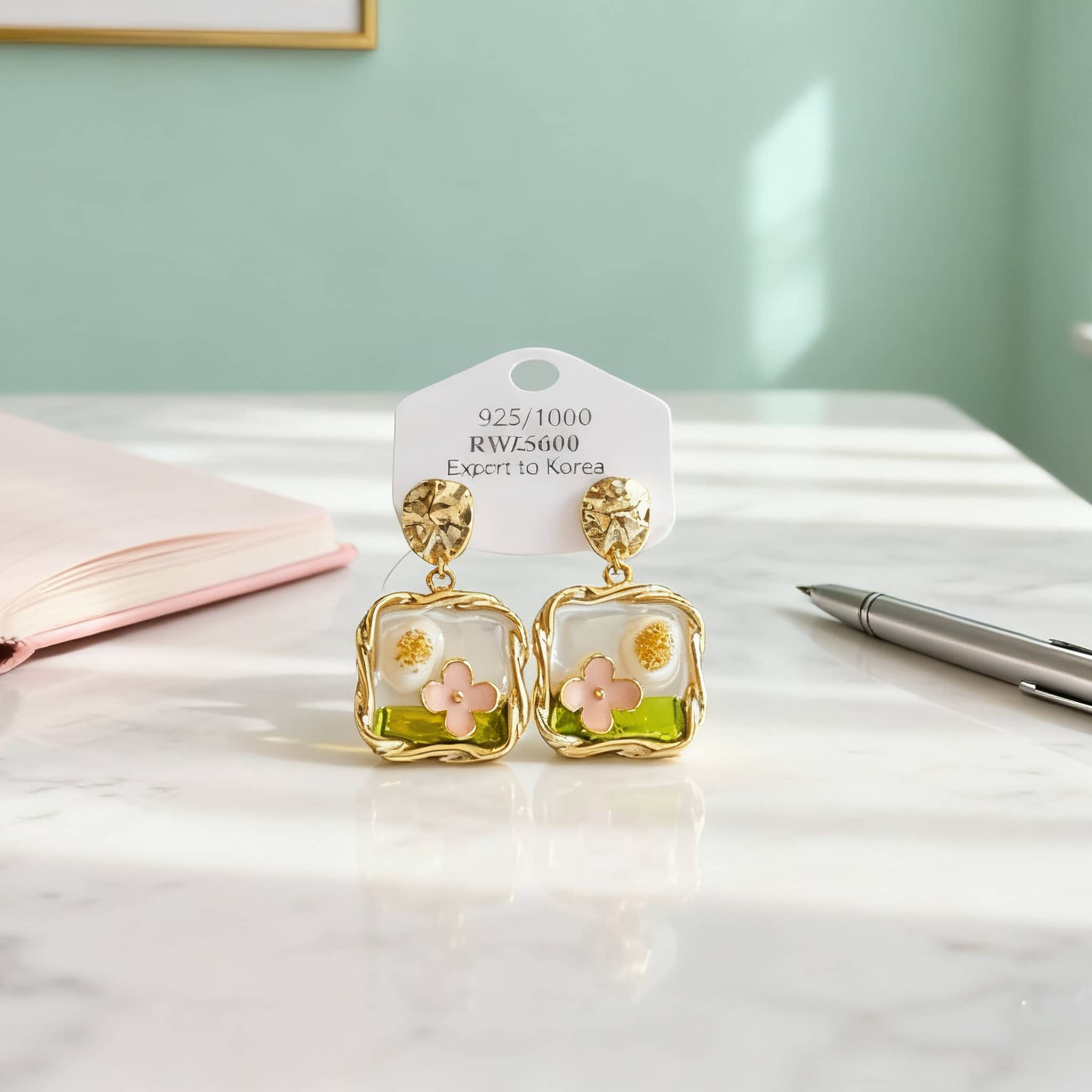 Garden enamel pearl earrings featuring floral designs with gold accents for a stylish look