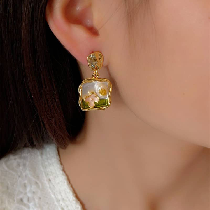 5 Senses garden enamel pearl earrings with floral design in gold setting, perfect for special occasions