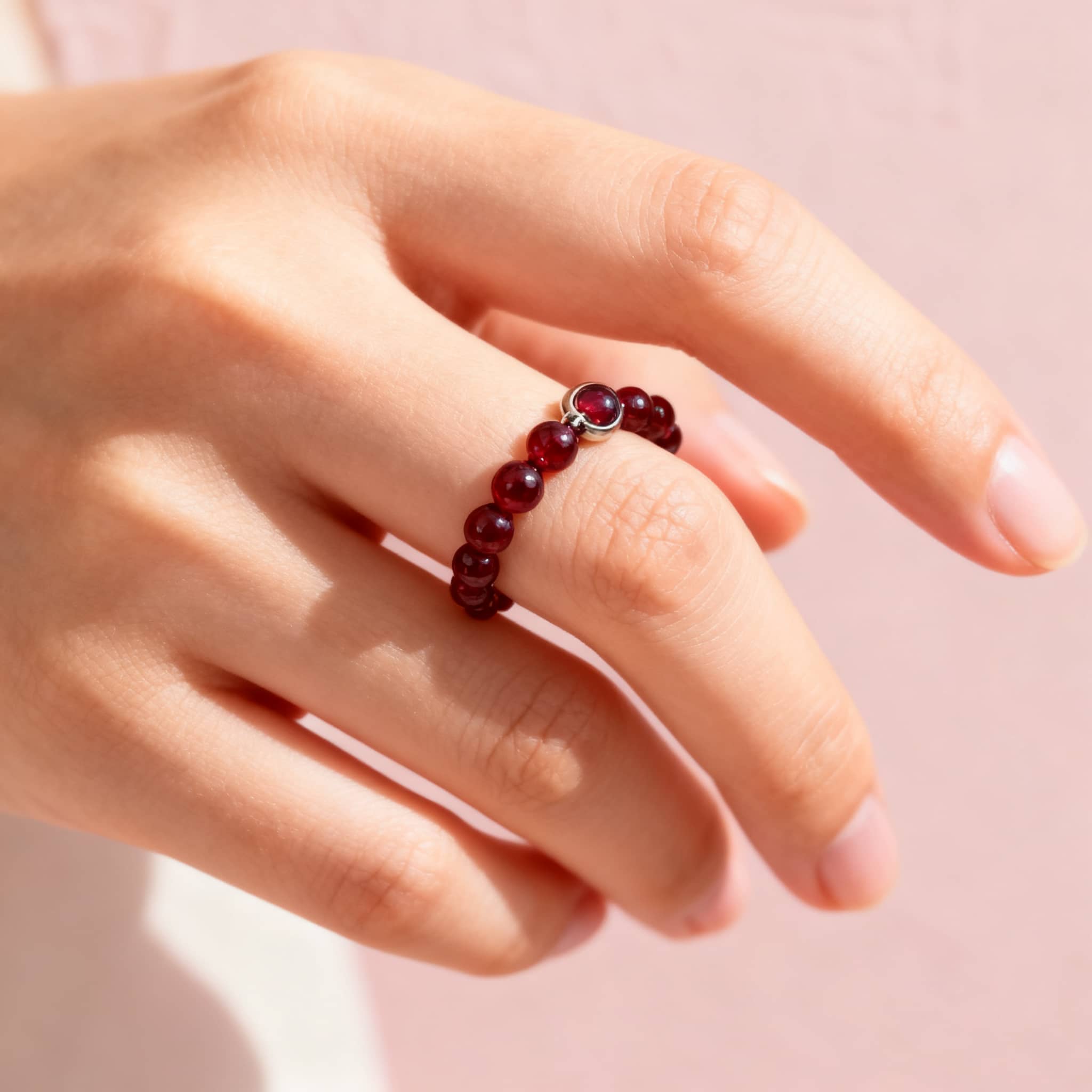 5 Senses garnet anxiety ring featuring a beaded design that promotes calmness and relaxation