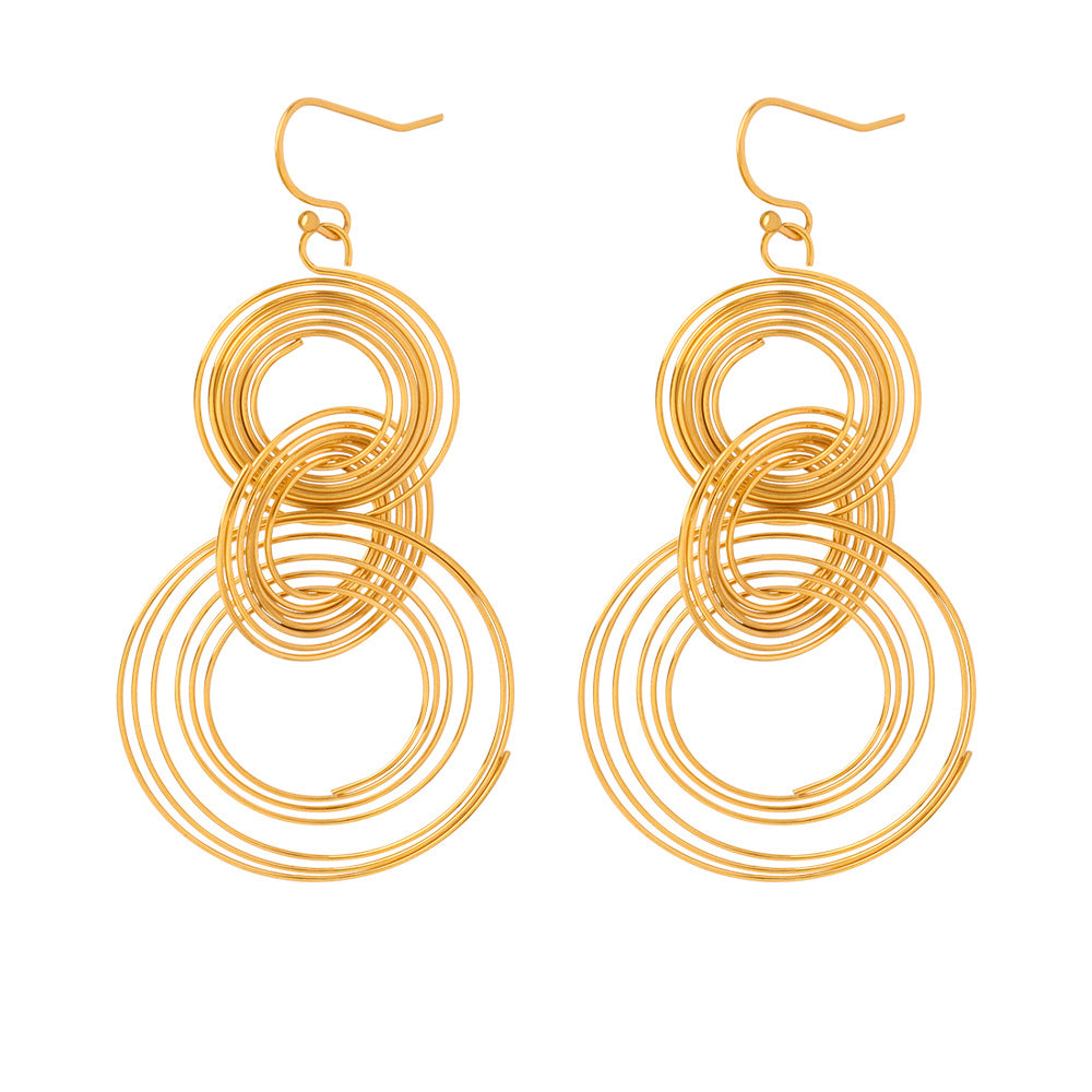Anxious gold hoop earrings designed as anxiety calming jewelry with overlapping circular rings