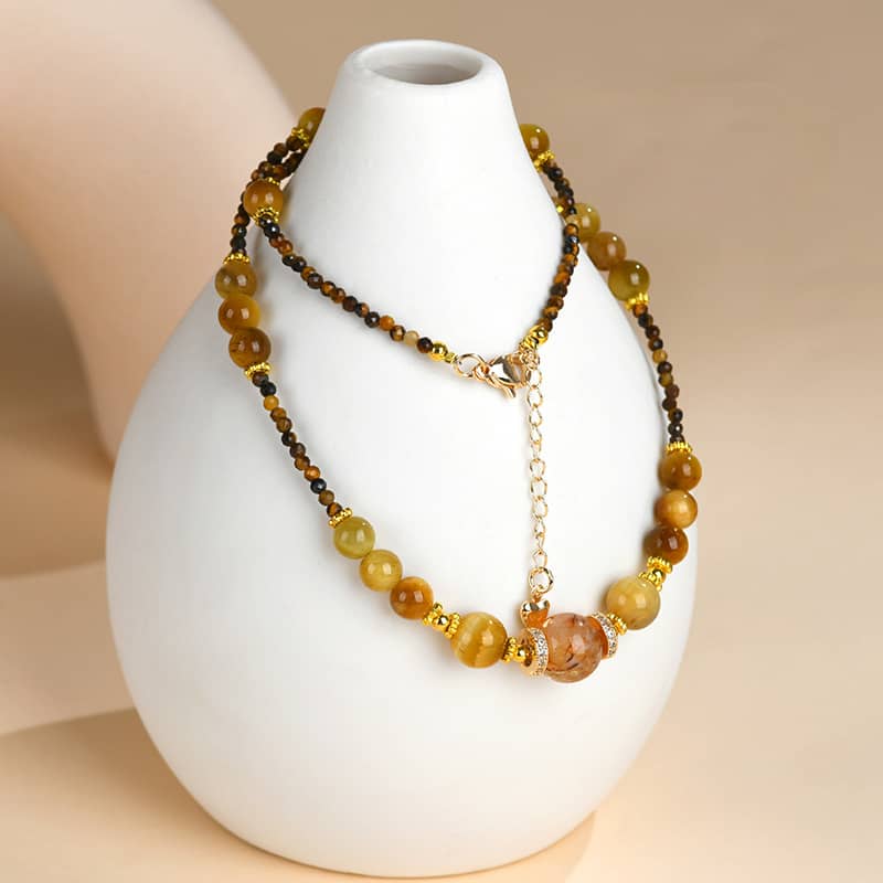 Golden tiger's eye anxiety necklace featuring polished beads for calming energy and style