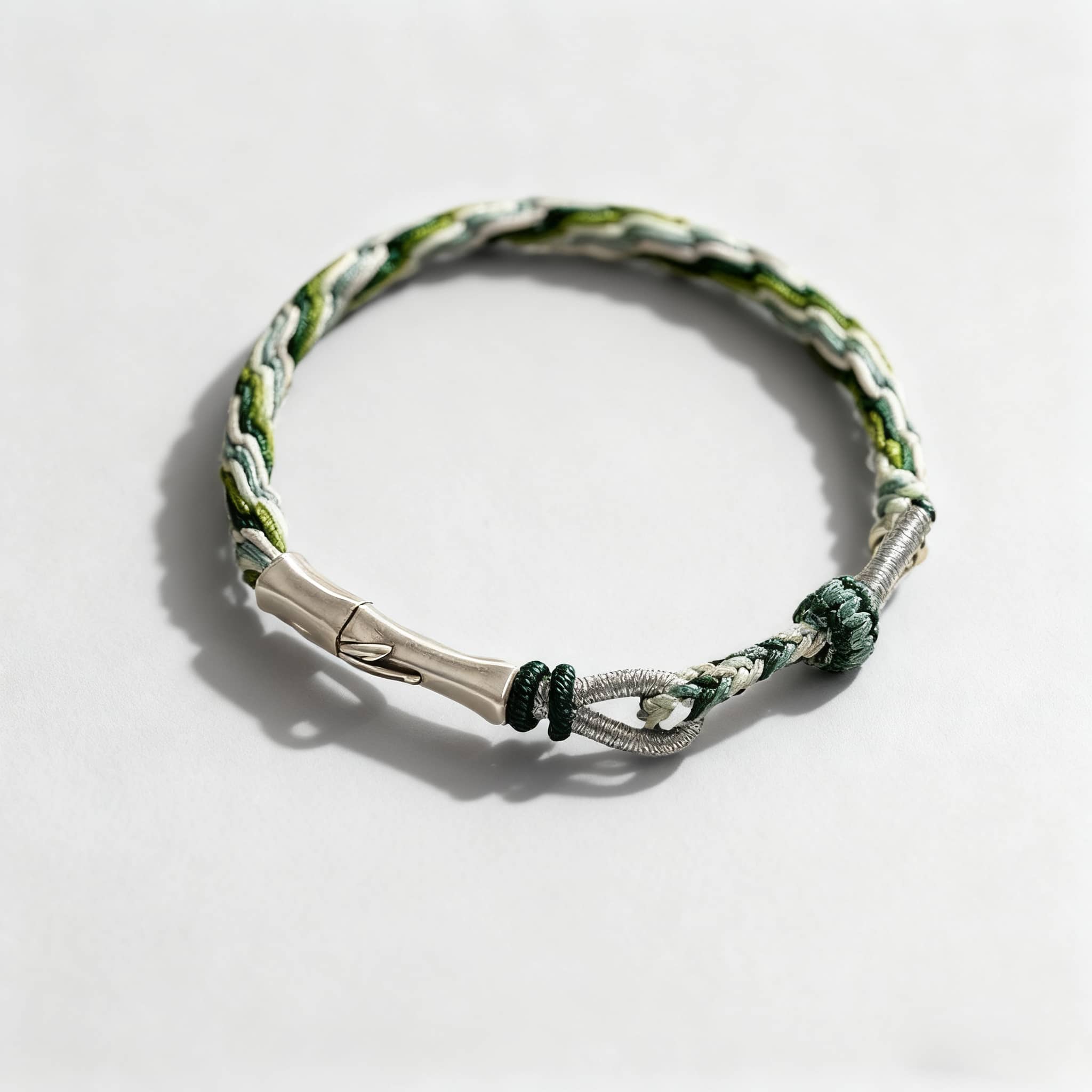 Green cord mindfulness bracelet from 5 Senses, featuring a stylish woven design and durable clasp