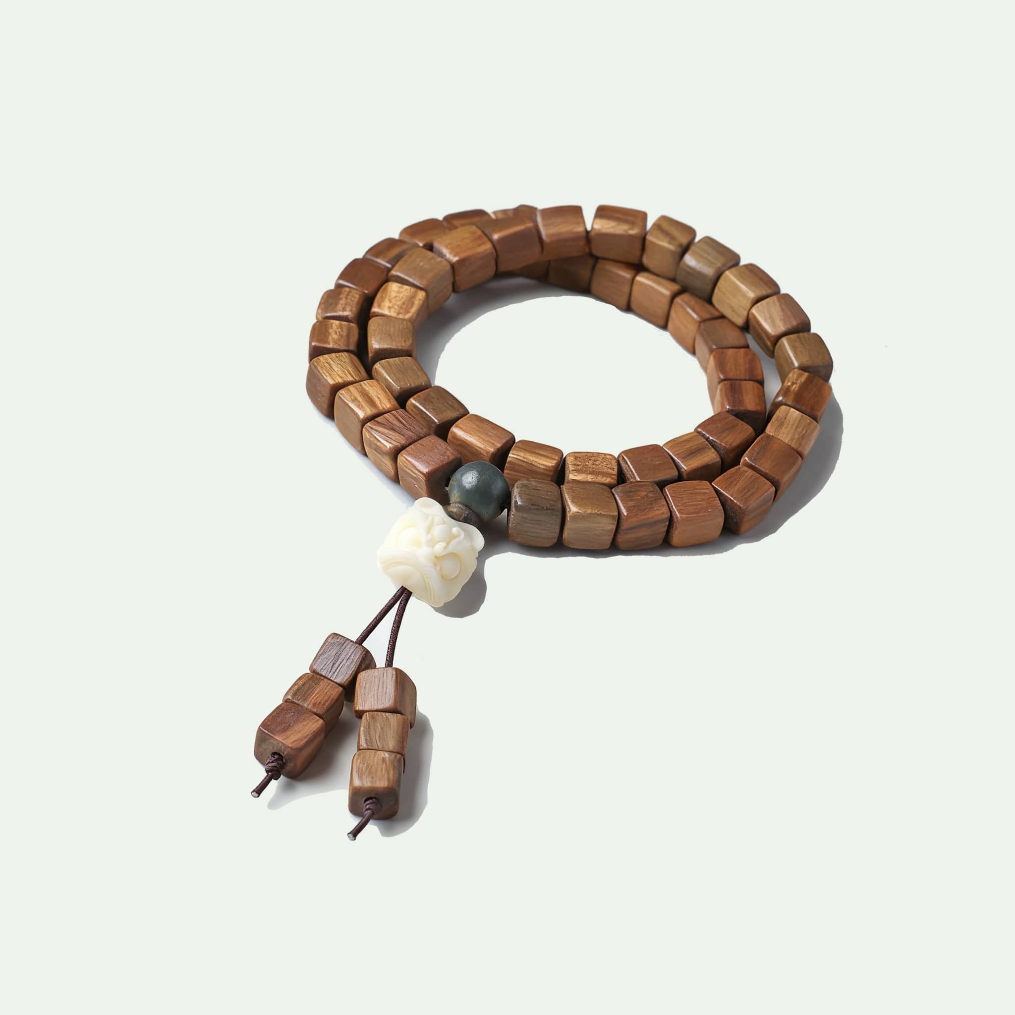 5 Senses Calm green sandalwood bracelet featuring natural wood beads for a soothing style