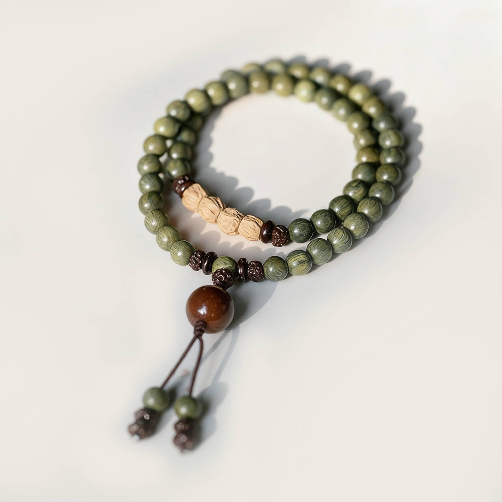 Green sandalwood mala bracelet with beads for meditation and stress relief from 5 Senses