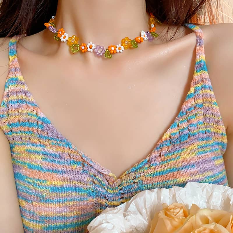 Joy hand-beaded floral necklace from 5 Senses featuring colorful beads and floral designs