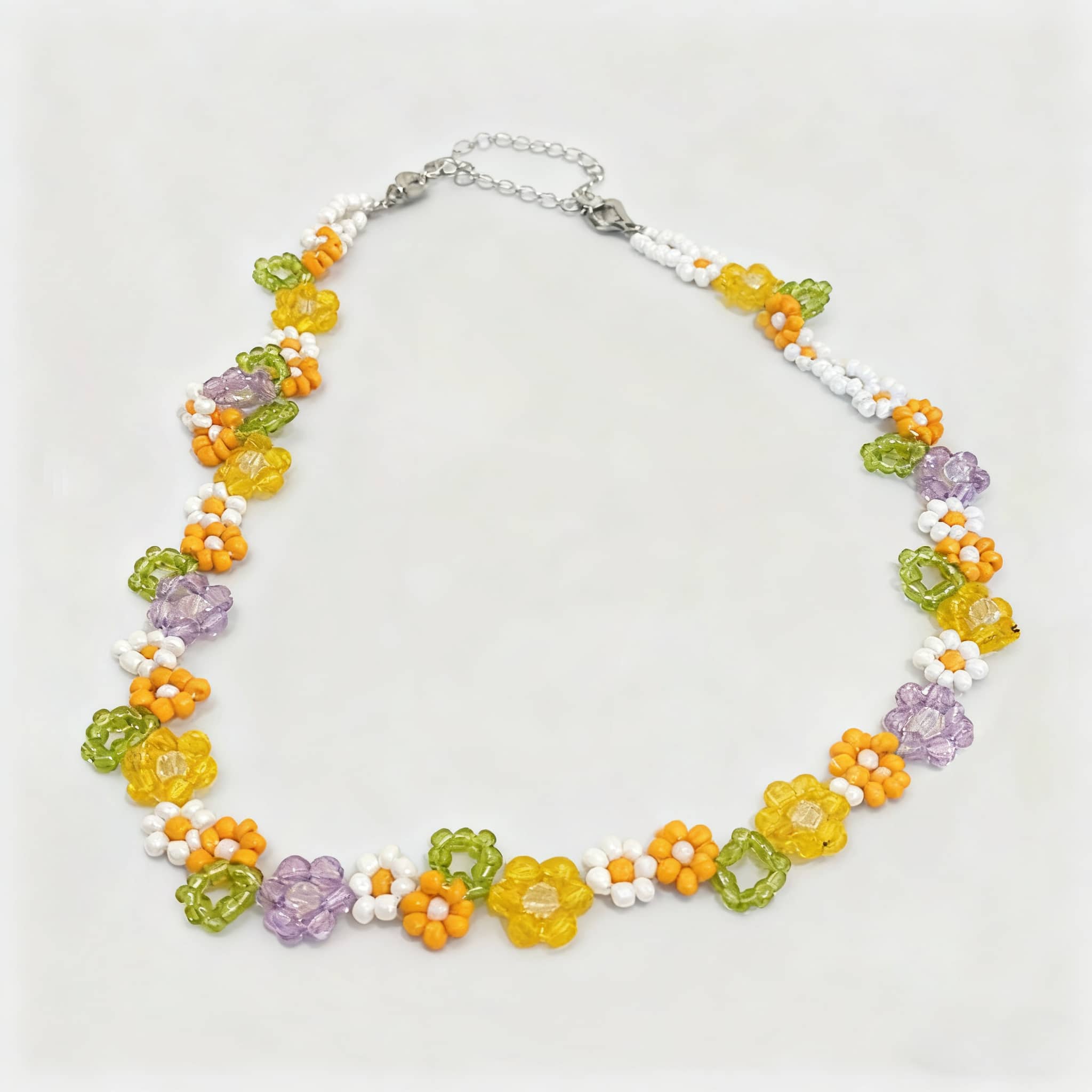 Hand-beaded floral necklace with colorful flowers and beads, perfect for adding charm to any outfit