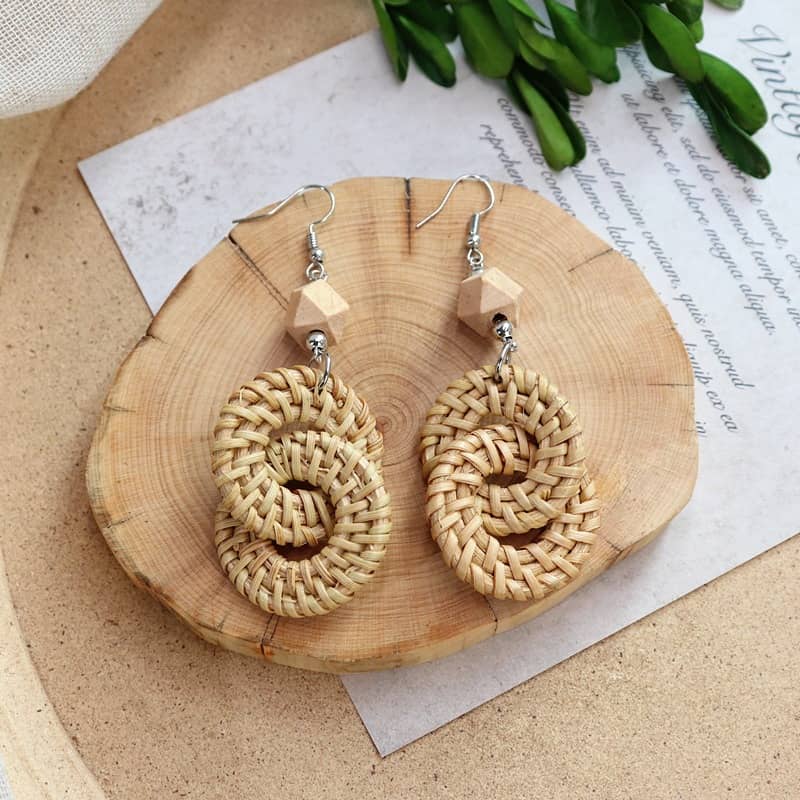 Handmade calming earrings with woven design and wooden accents for a relaxing aesthetic