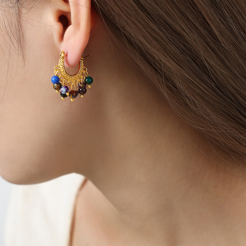Gold Calm earrings with colorful healing crystal earrings for women worn on ear