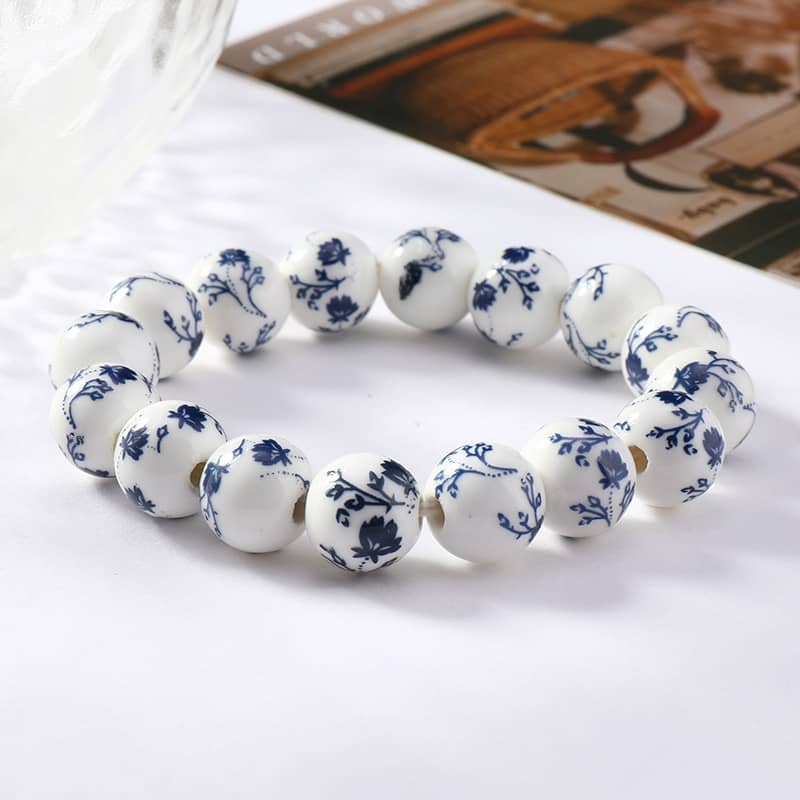 Ink splash porcelain bracelet featuring intricate floral patterns and a polished finish
