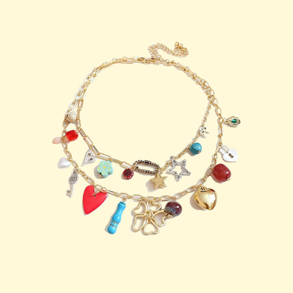 Joy charm locket layered necklace featuring colorful charms and gold links for a trendy look