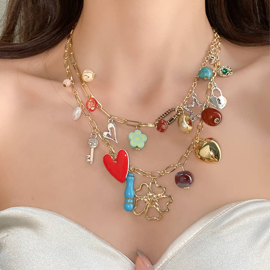 Joy charm locket layered necklace with colorful charms and gold chain for a trendy look