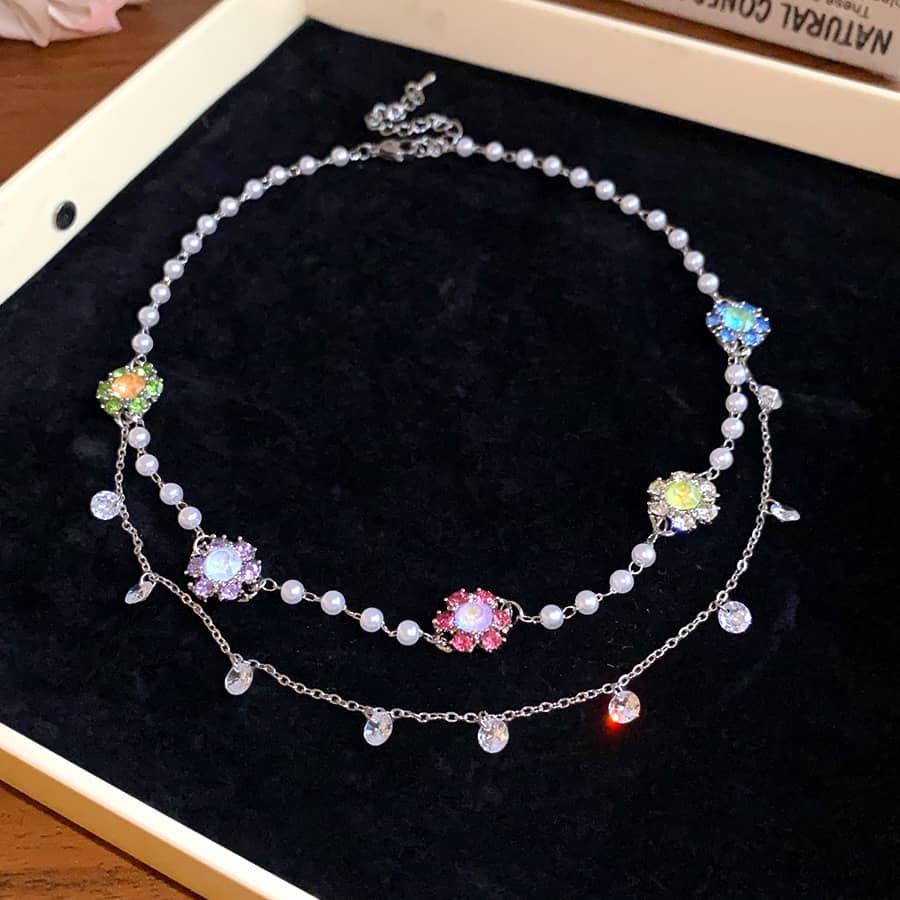 Joyful gemstone necklace for women featuring colorful stones and elegant pearl design