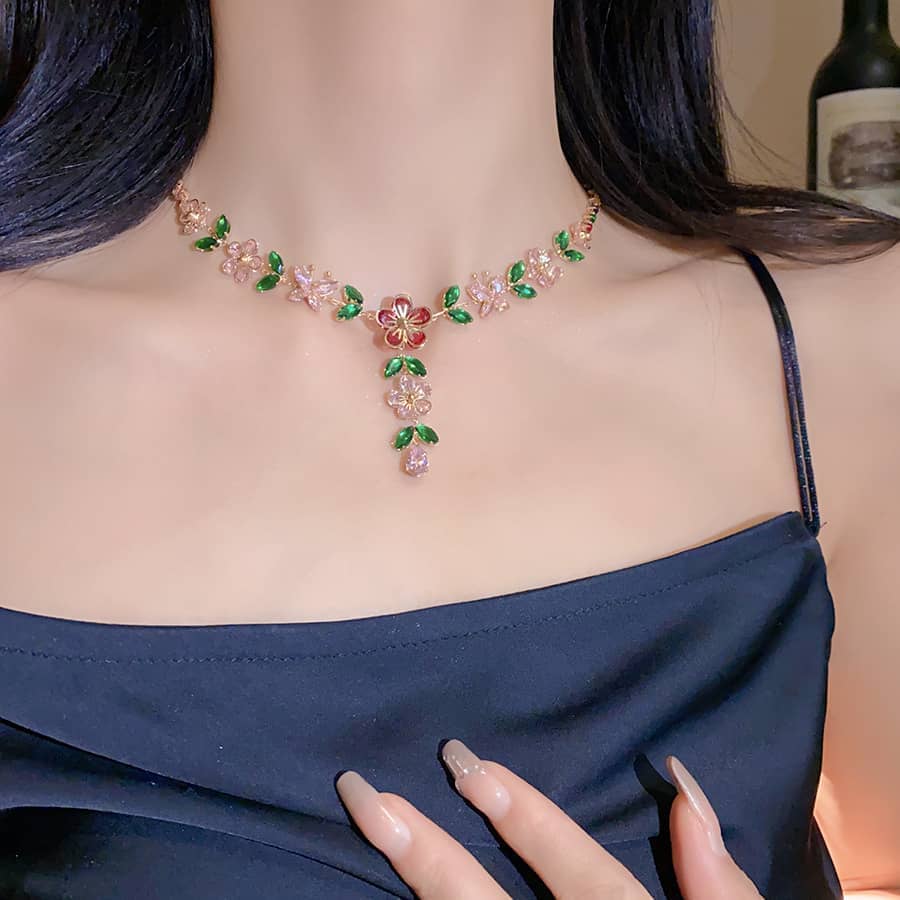 Joyful zircon flower necklace with colorful floral designs sparkling on a model's neck