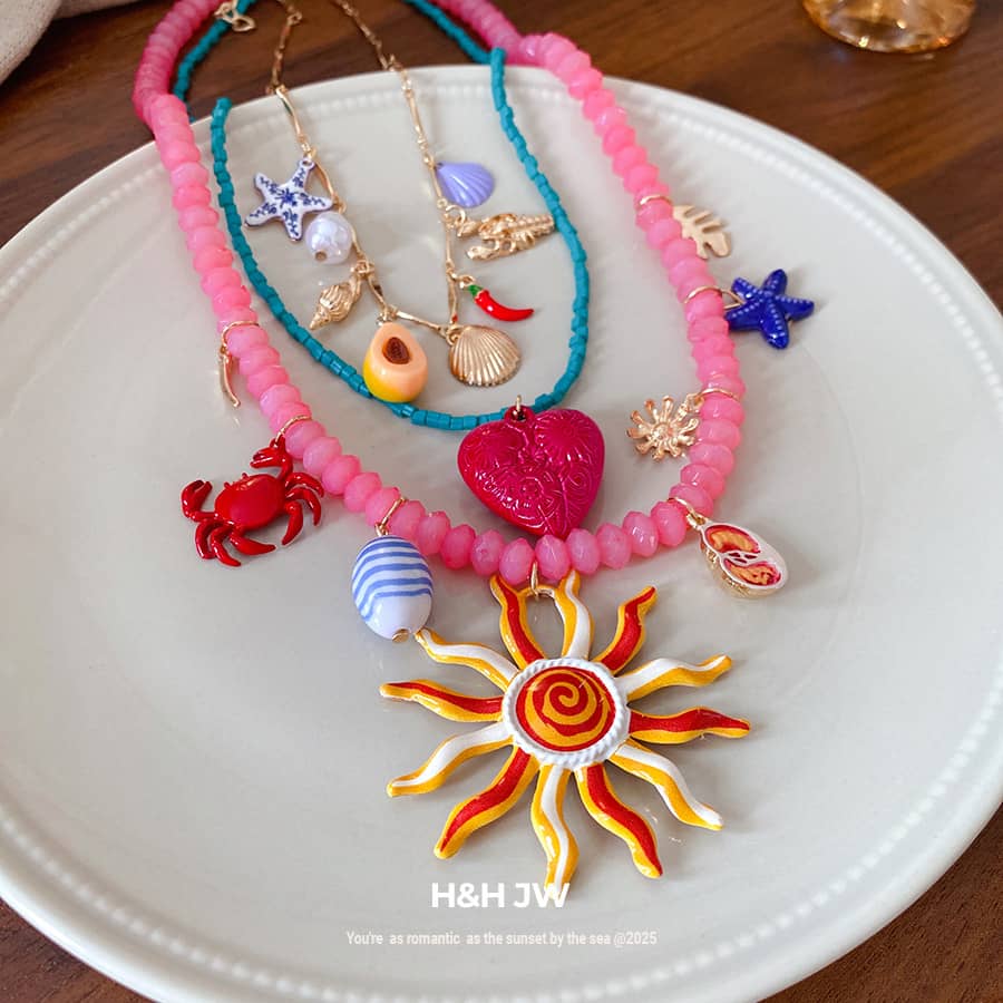 Joy layered resin glass pendant necklace with colorful beads and sea-themed charms
