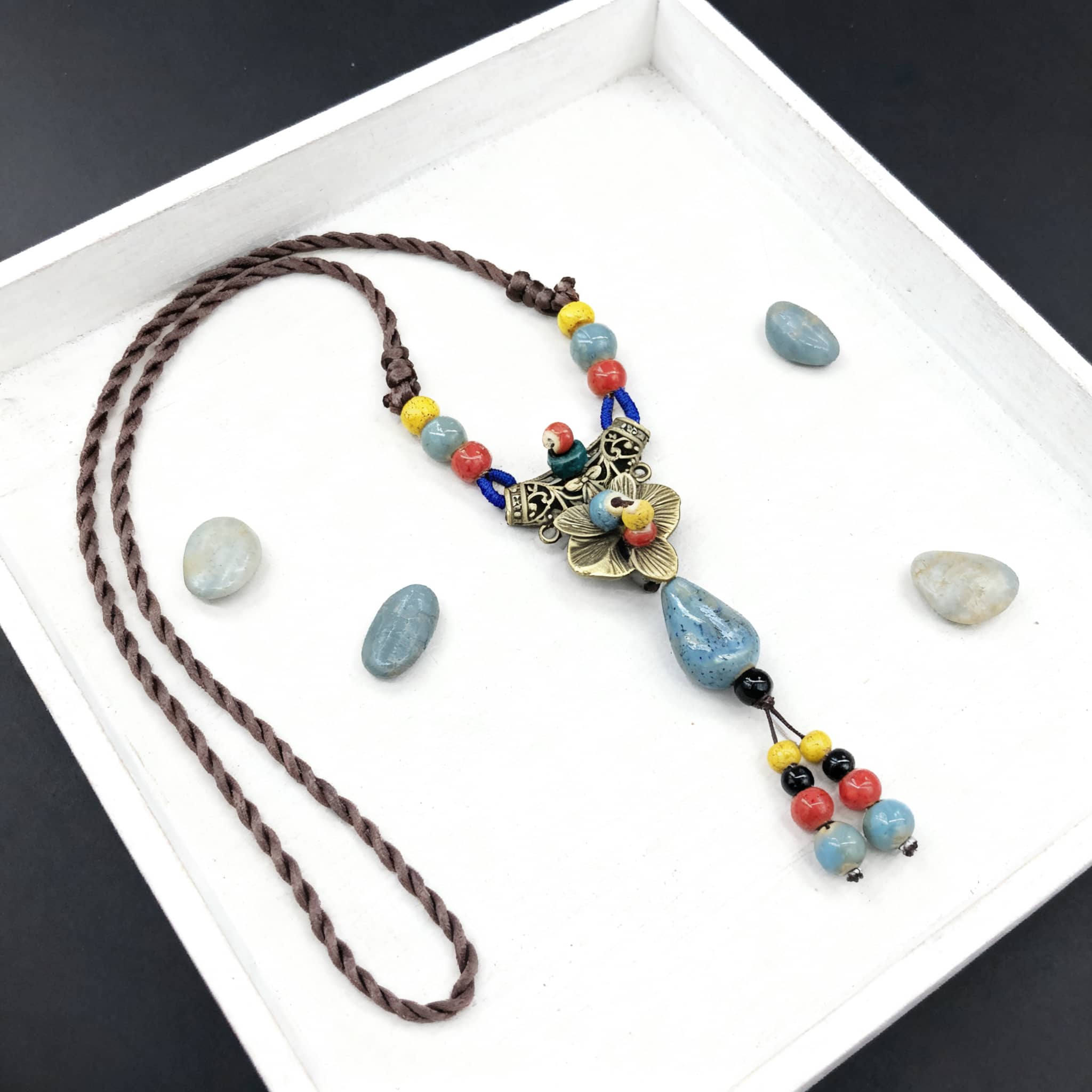 Linen ceramic vintage metal necklace featuring colorful beads and a decorative pendant