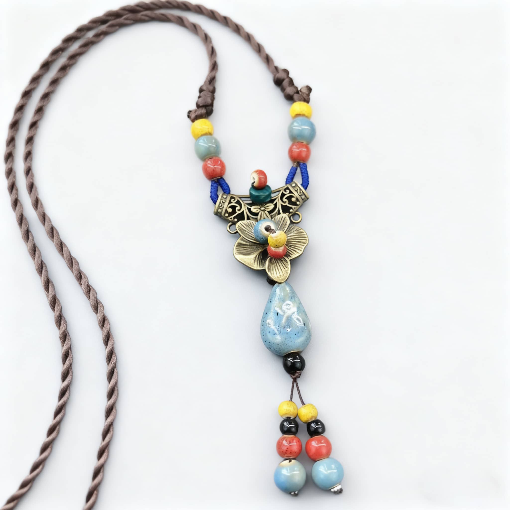 Linen ceramic vintage metal necklace with colorful beads and a floral pendant detail