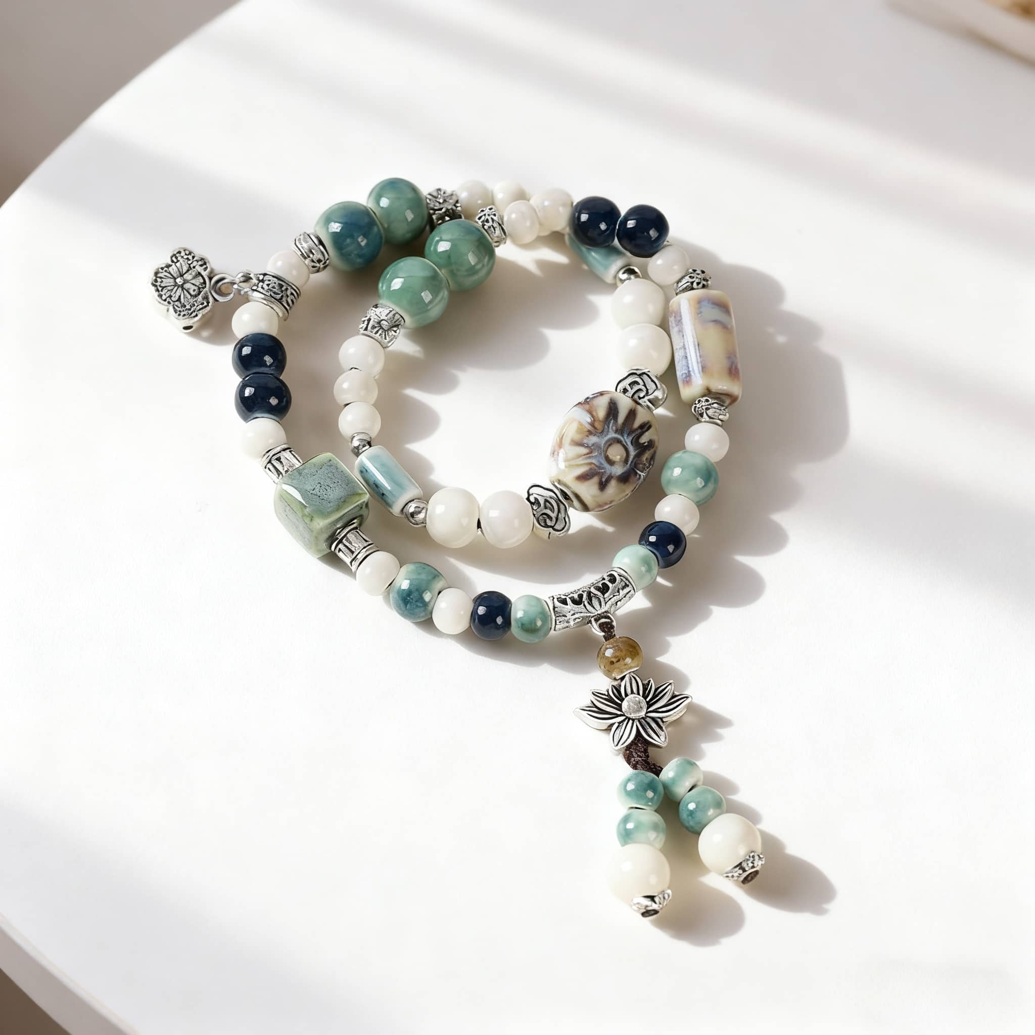 Lotus ceramic bead bracelet featuring intricate designs and vibrant colors for stylish accessory lovers