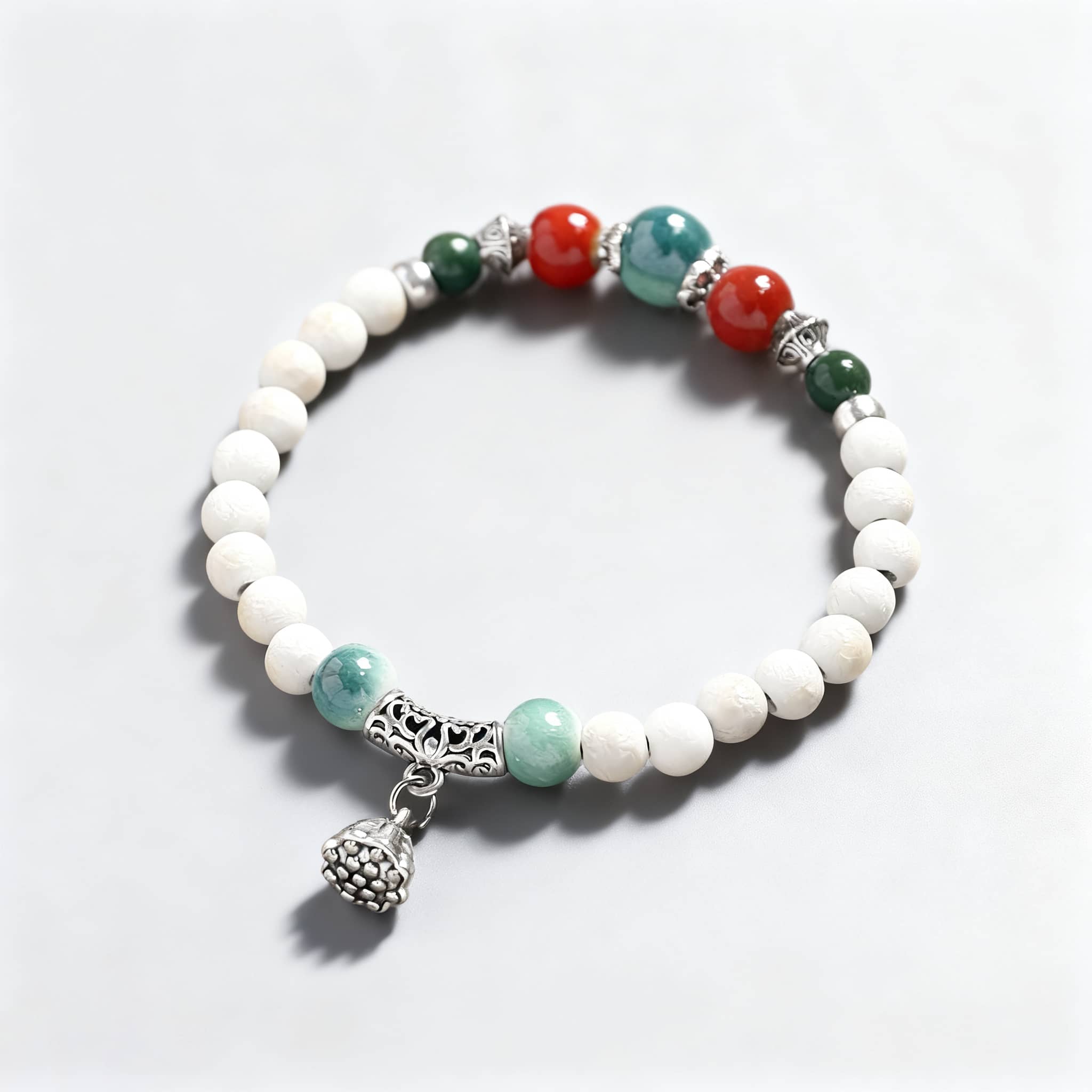 Lotus ceramic bracelet for self care featuring colorful beads and silver accents