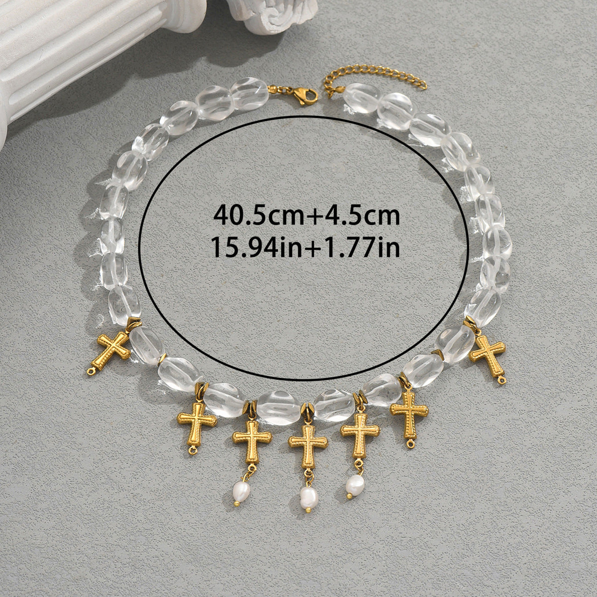gold cross pearl necklace on clear beaded chain with multiple gold crosses and dangling pearls approx 40 cm adjustable