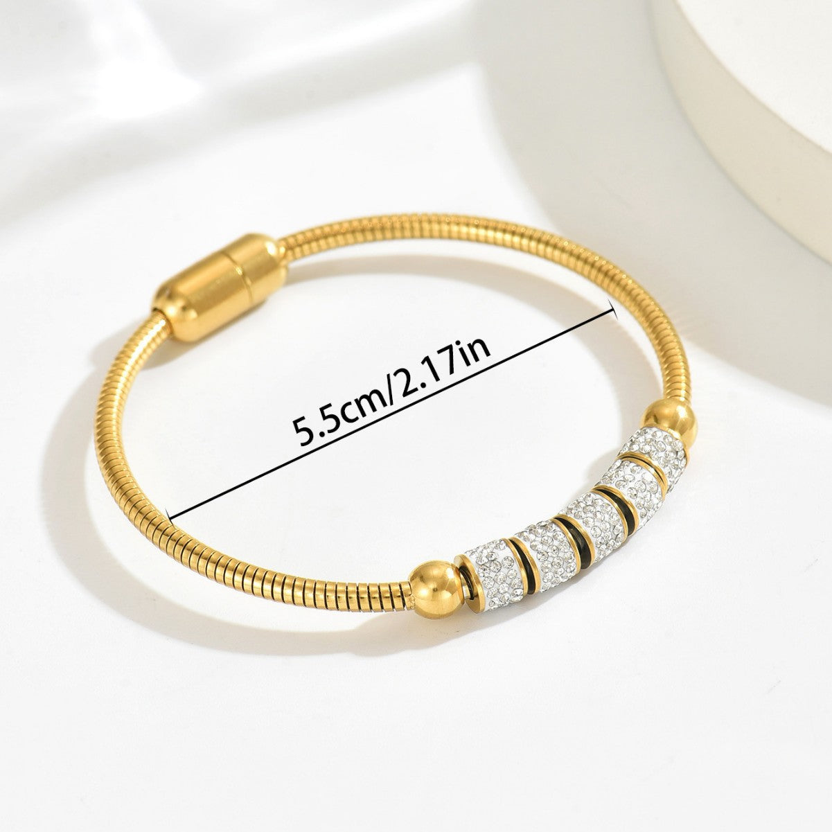 golden geometric magnetic bracelet with textured snake chain and crystal geometric spacer beads 5.5cm diameter