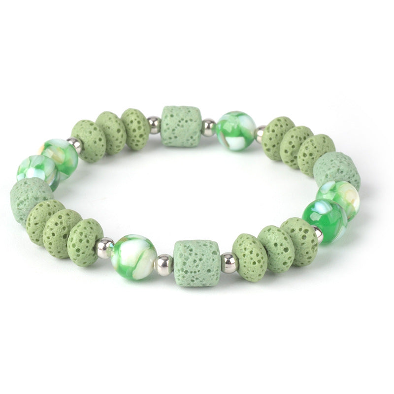 Mens healing lava rock bracelet with green lava beads and glossy round accent beads