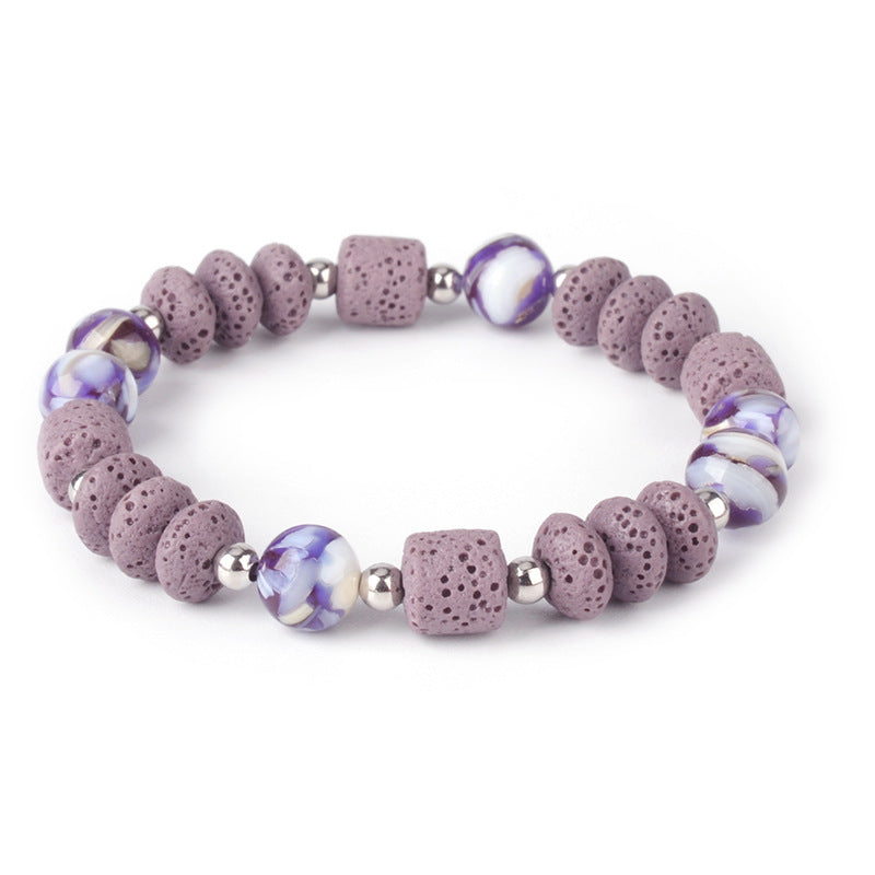 Mens healing lava rock bracelet with purple lava beads and marble-patterned accent beads
