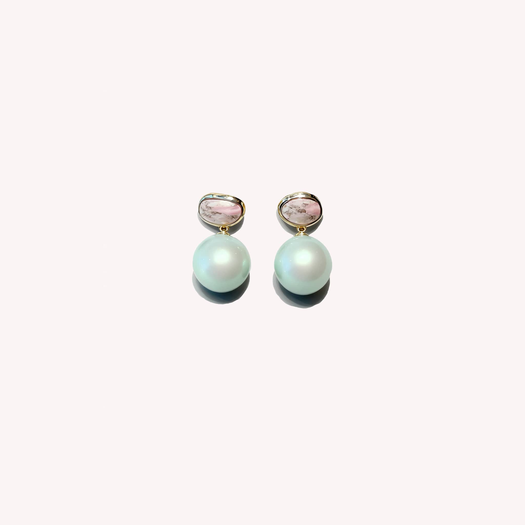 Mint pearl ceramic earrings with elegant design and unique pink accents for stylish looks