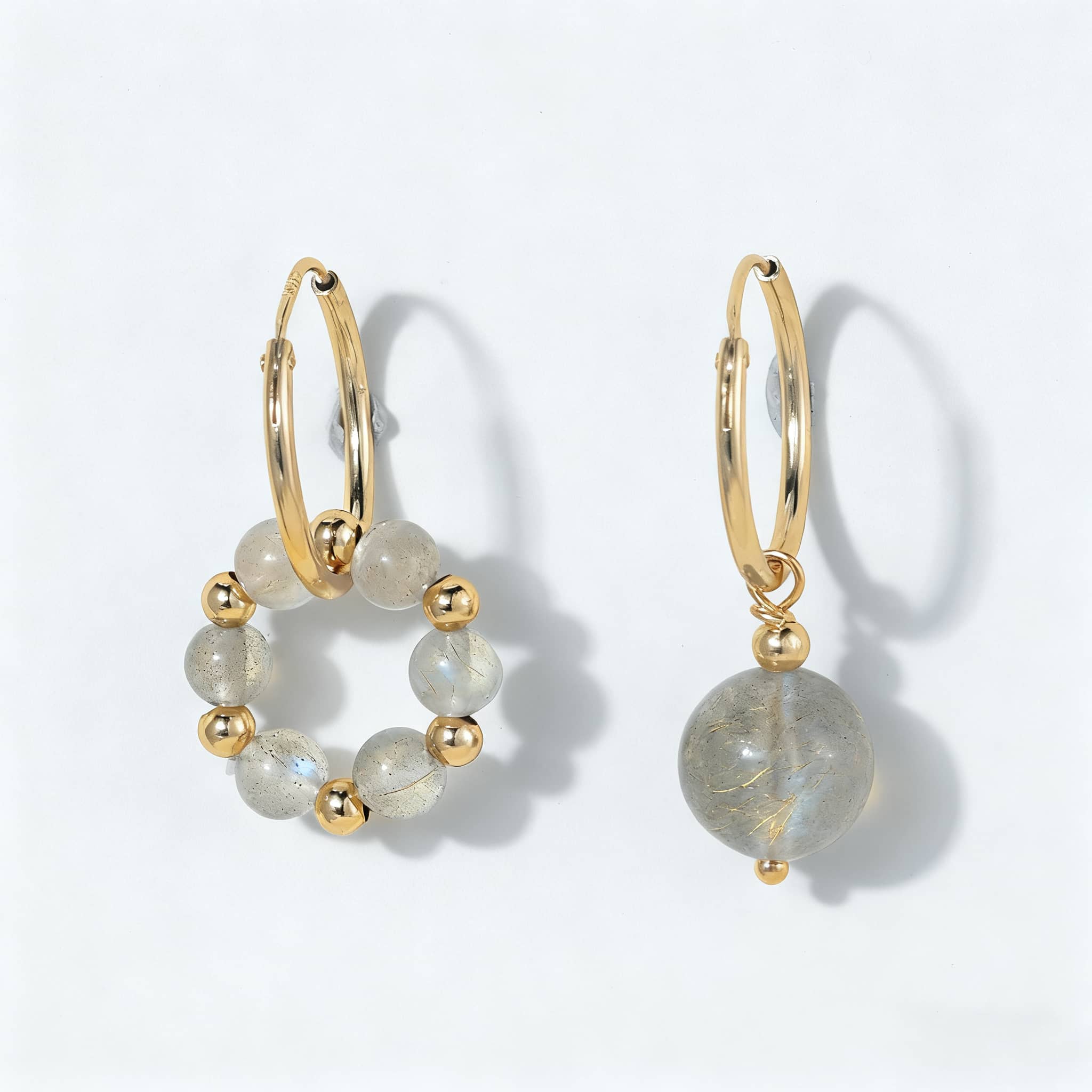 Anxious moonstone anxiety earrings with gold accents and delicate gemstone details