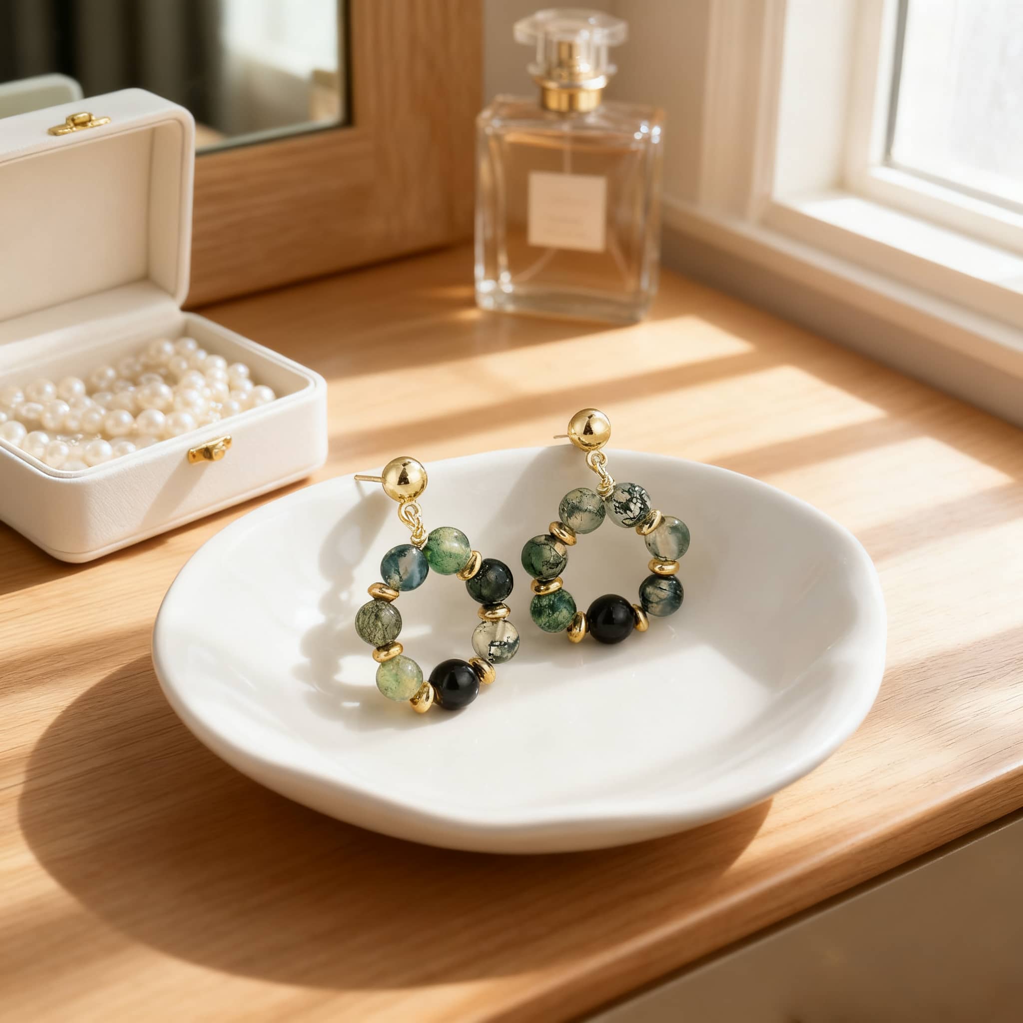 Moss agate anxiety earrings featuring green and black beads for calming and stylish wear