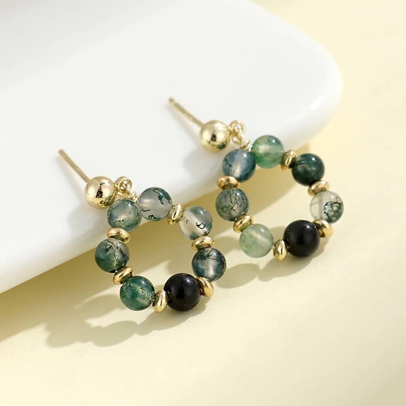Moss agate anxiety earrings featuring green gemstones and gold accents for a calming look
