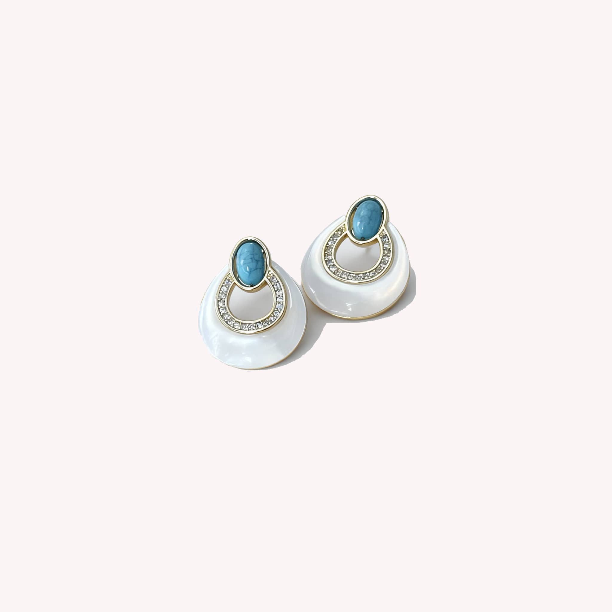 Elegant mother-of-pearl and blue turquoise earrings with sparkling accents for a stylish look