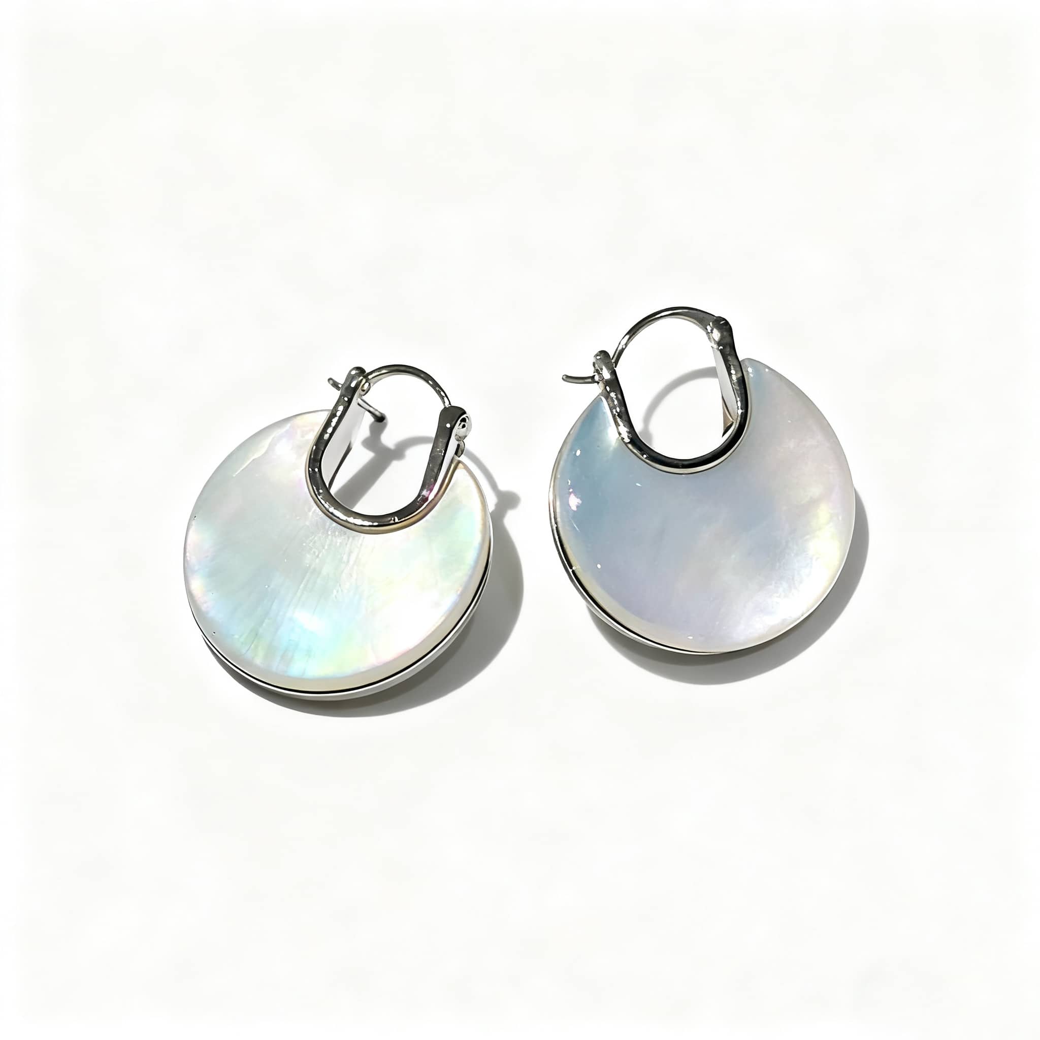 Elegant mother of pearl ear cuffs by 5 Senses with a shiny finish for a sophisticated look