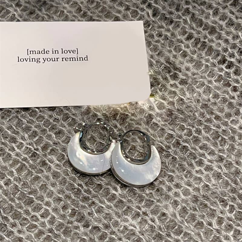 5 Senses mother of pearl ear cuffs with sleek silver accents for elegant styling