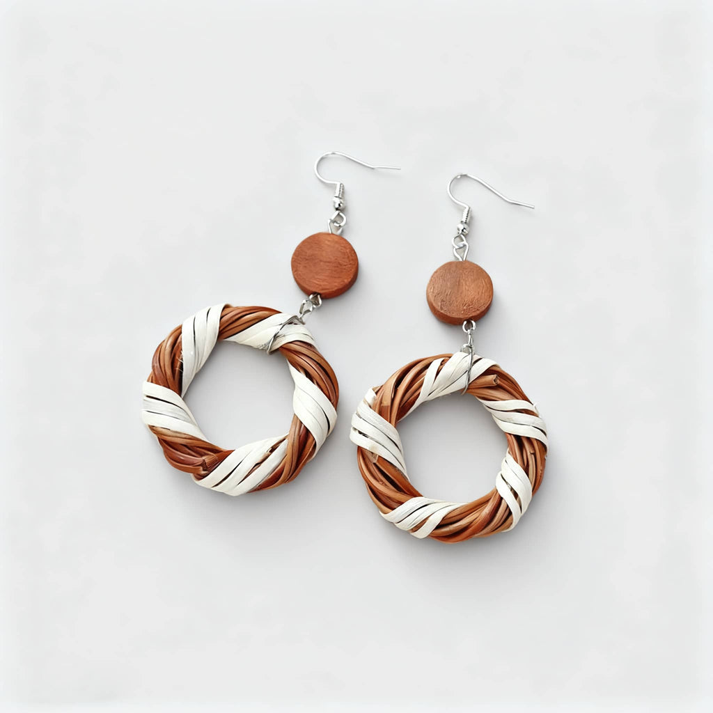 Natural bamboo circle earrings featuring a woven design with brown and white accents