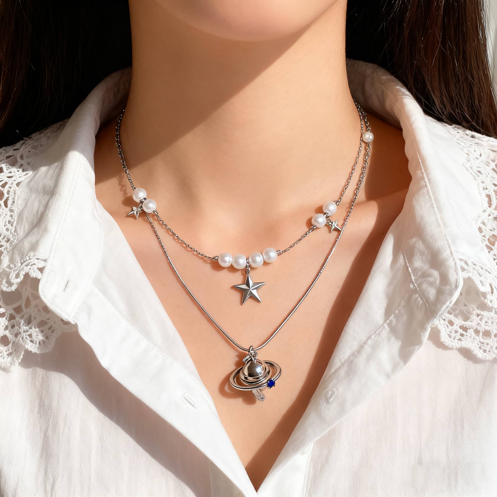 Stylish 5 Senses pearl and Saturn pendant necklace layered with star accents