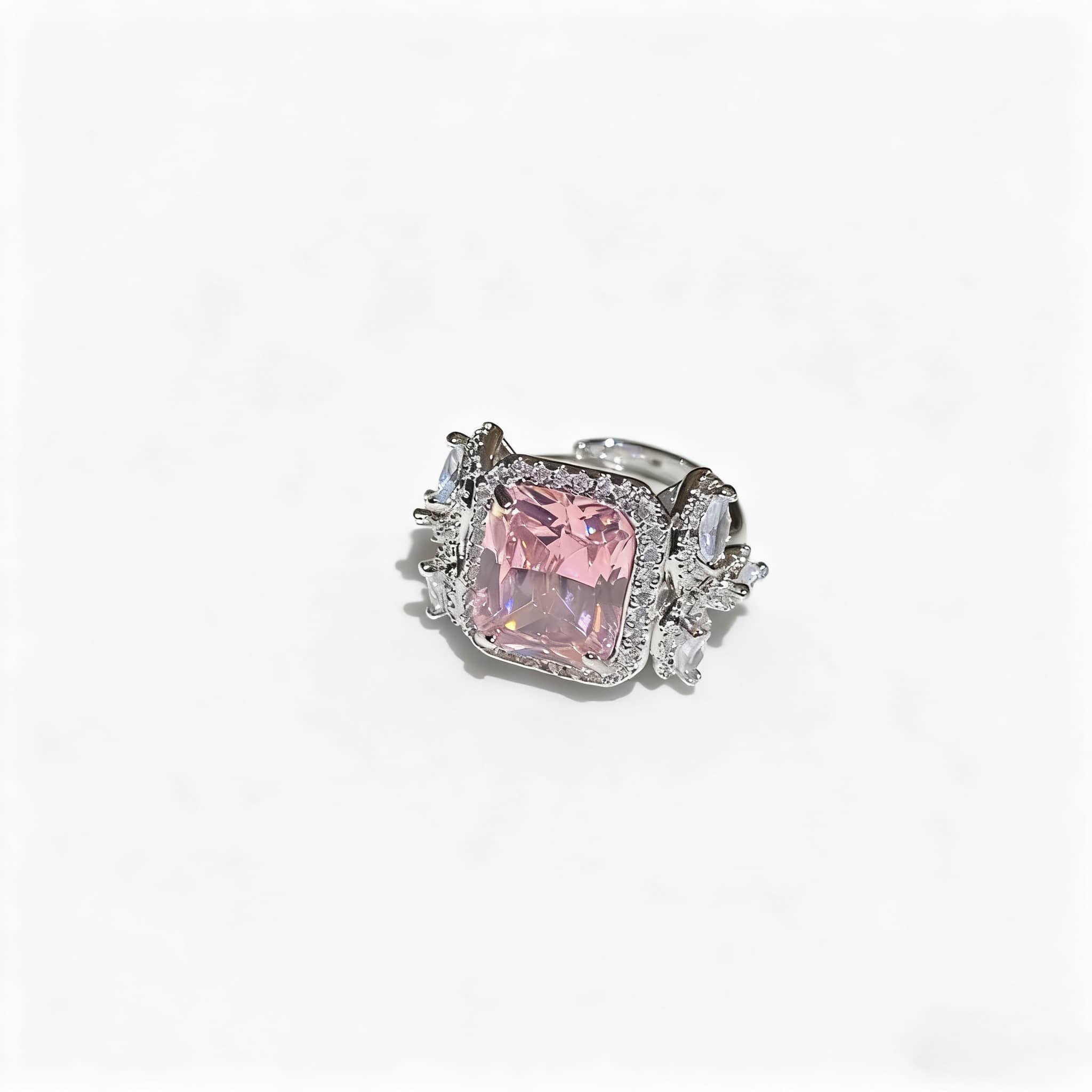 Elegant pink zircon silver ring with a large square pink stone and sparkling accents